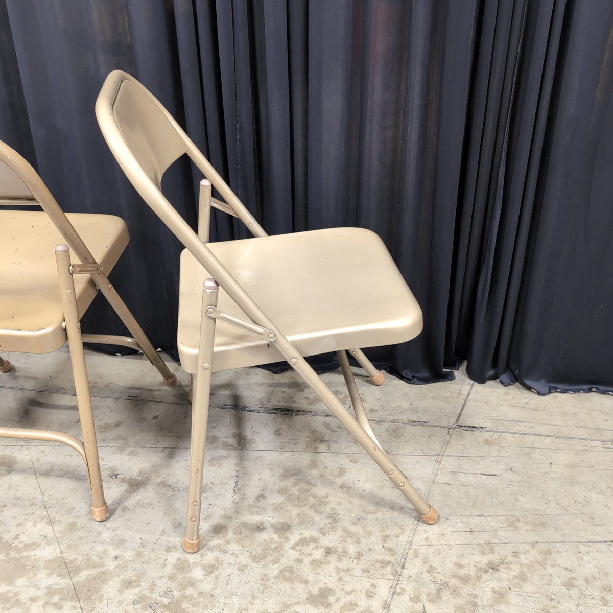 Set of Three Tan Metal Folding Chair with Rubber Feet
