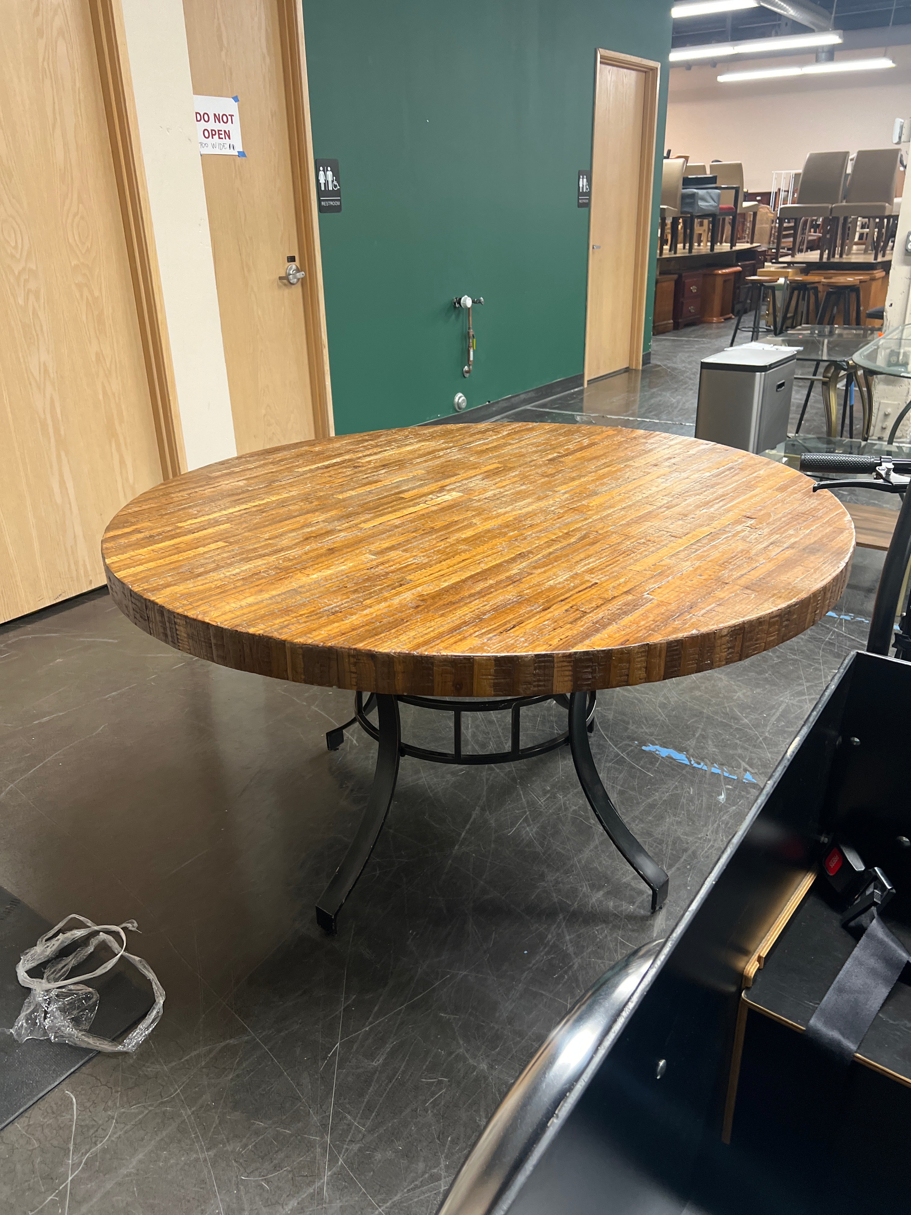 Rustic Round Wood Plank Dining Table with Industrial Metal Base