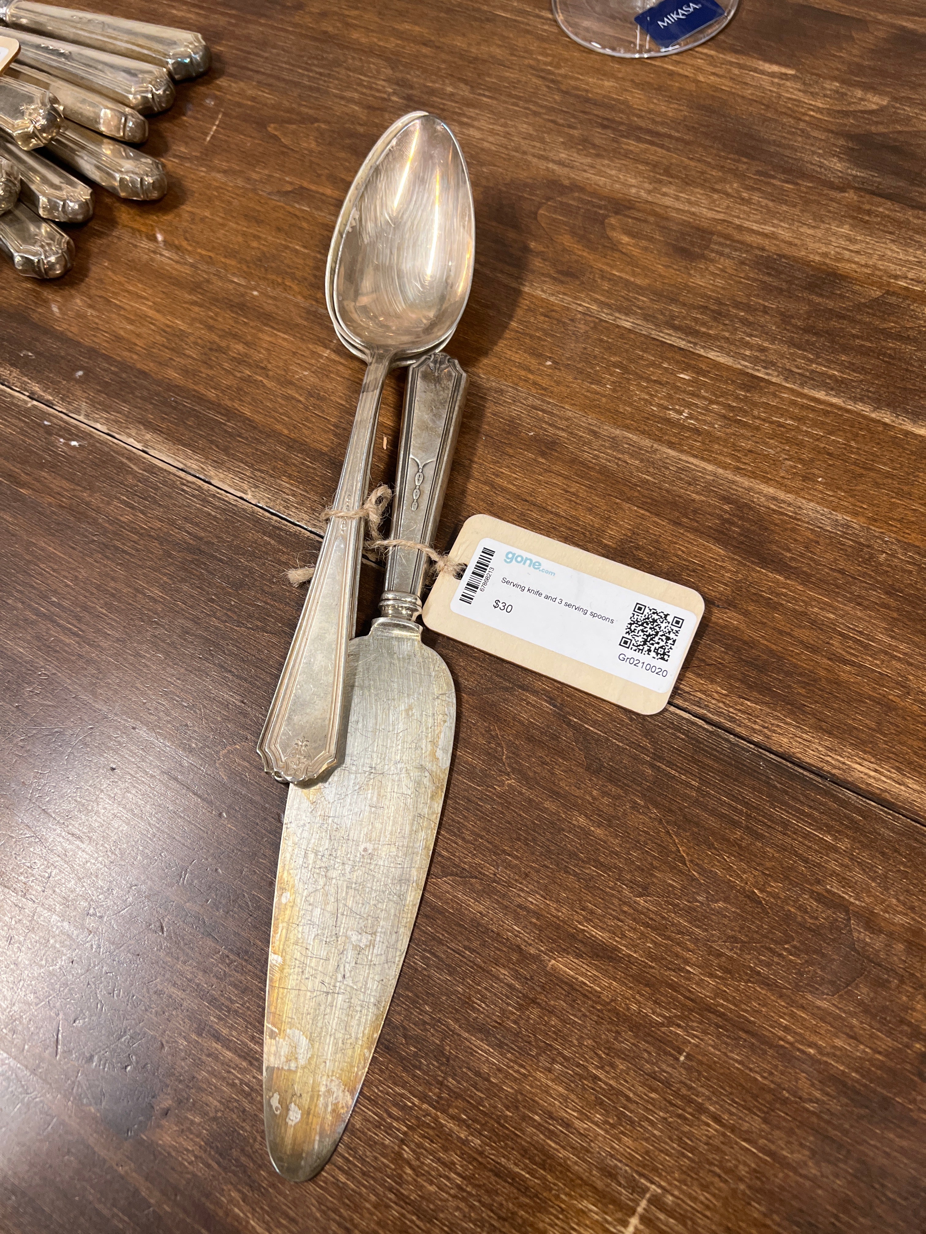 Serving knife and 3 serving spoons