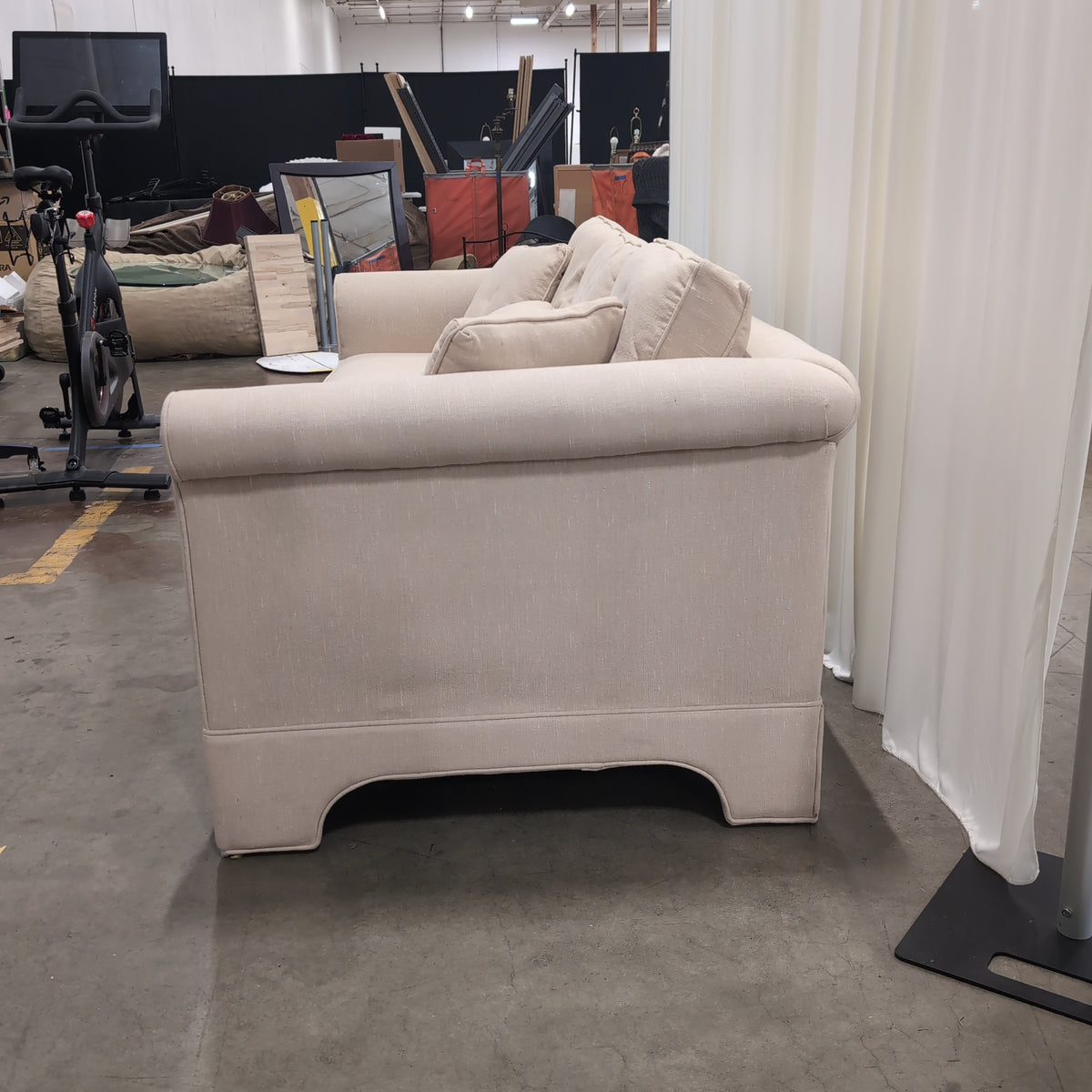 Beige Upholstered Rolled Arm Couch