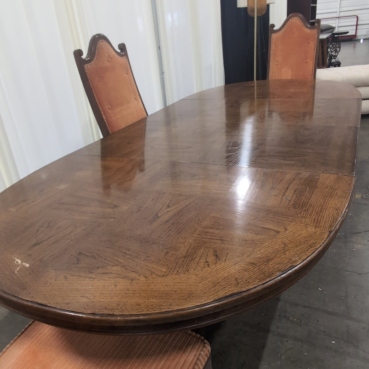 Traditional Dark Wood Oval Dining Table with Four Chairs