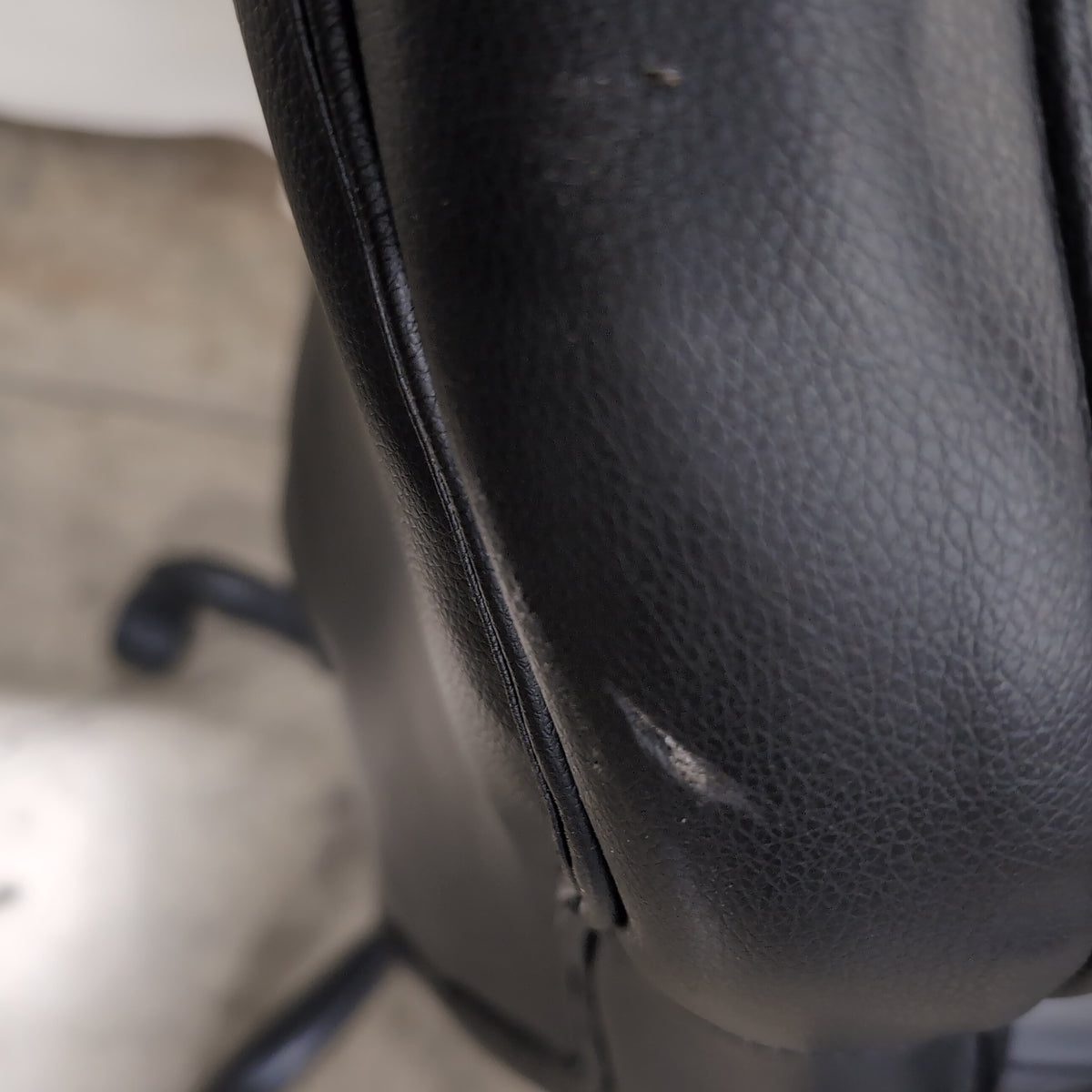 Black Faux Leather Swivel Office Chair with Padded Arms