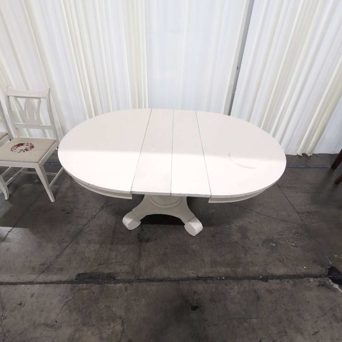 White Painted Wood Pedestal Dining Table with Leaves