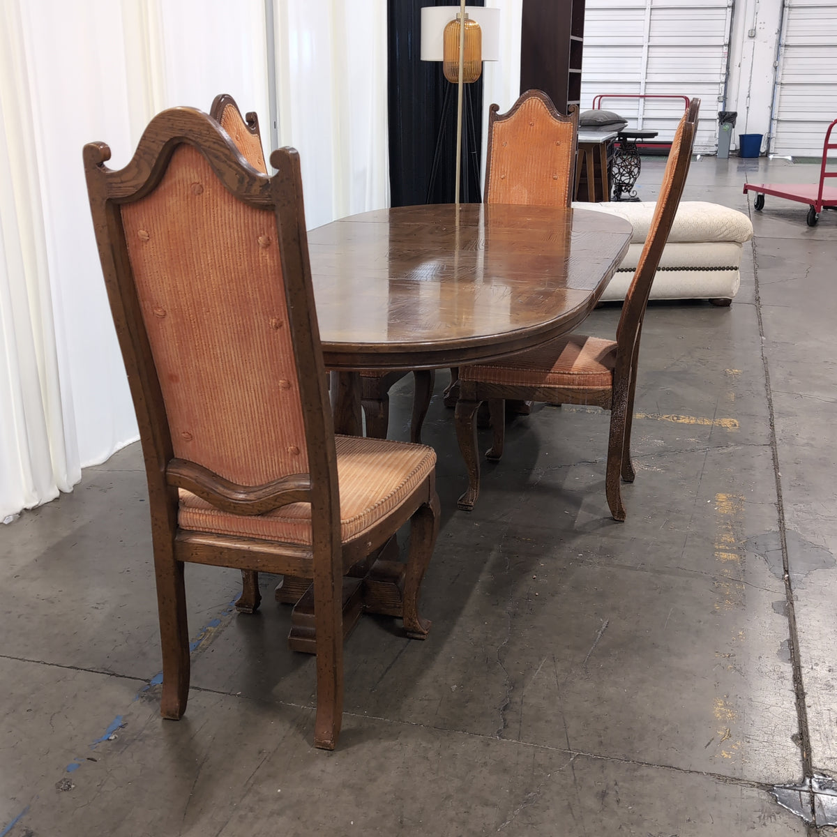 Traditional Dark Wood Oval Dining Table with Four Chairs