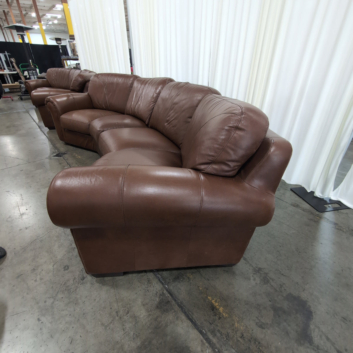 Brown Leather Curved Sectional Couch
