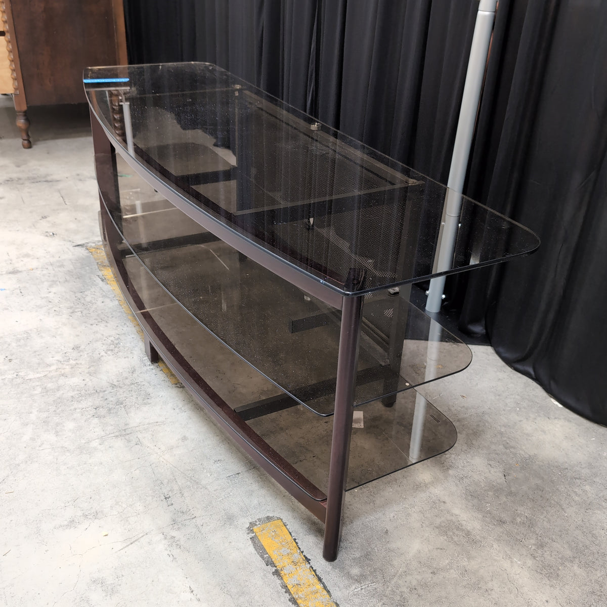 Dark Wood Curved Front Three-Tier TV Stand with Glass Shelves