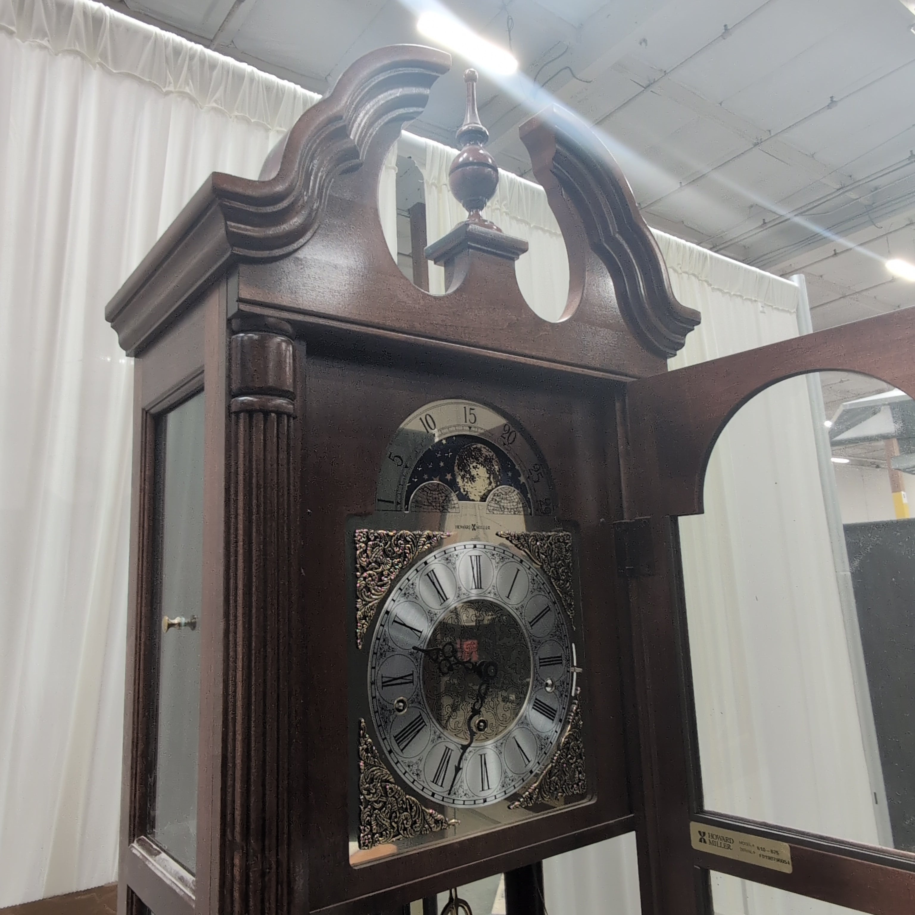 Howard Miller Decorative Wood Grandfather Clock with Brass Pendulum
