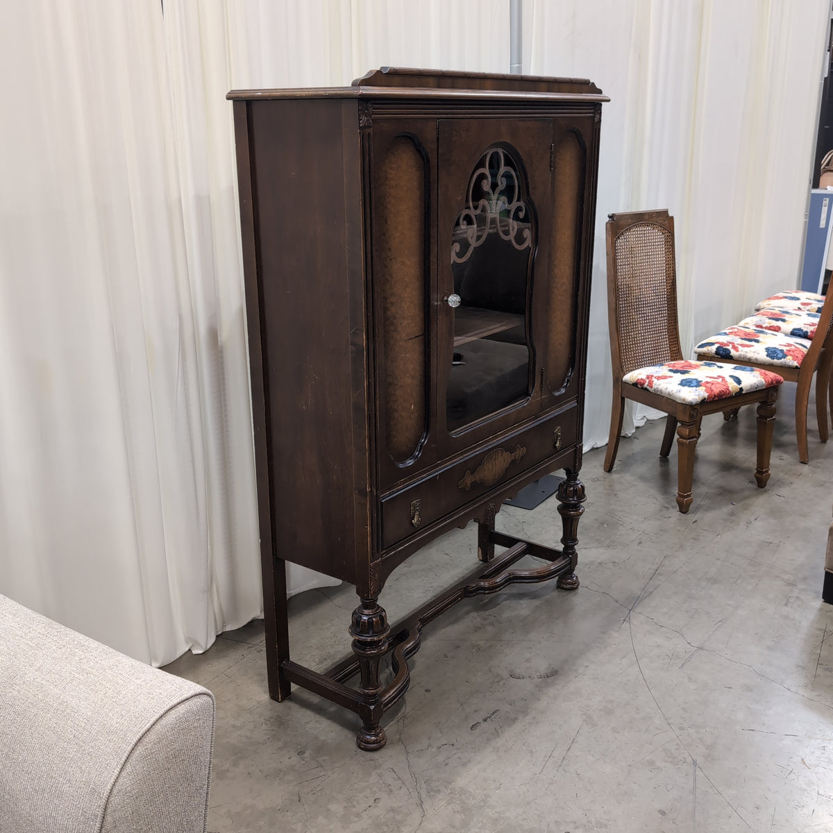 Ornate Dark Wood China Cabinet with Scrollwork