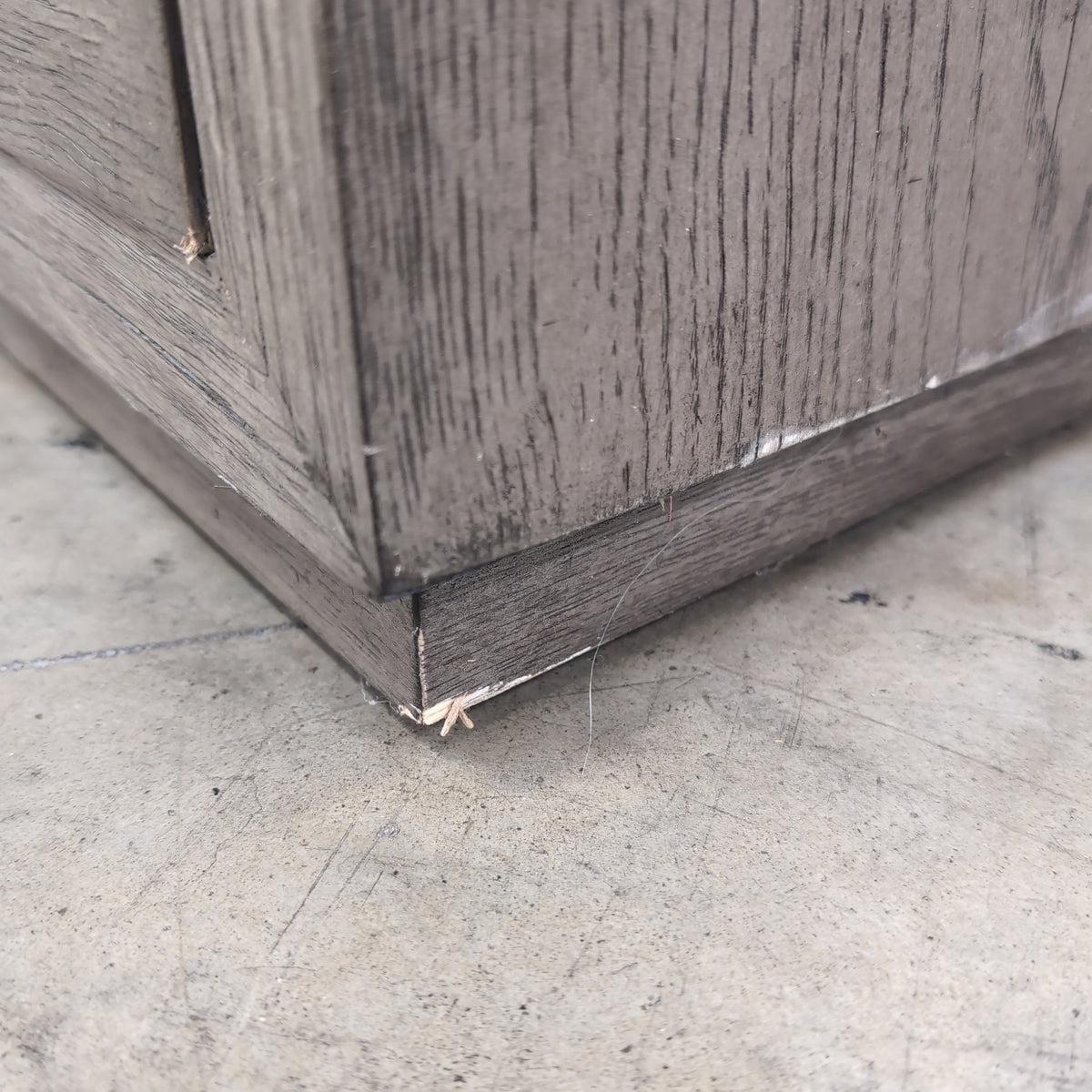 Light Wood Two-Drawer Nightstand with Textured Hardware
