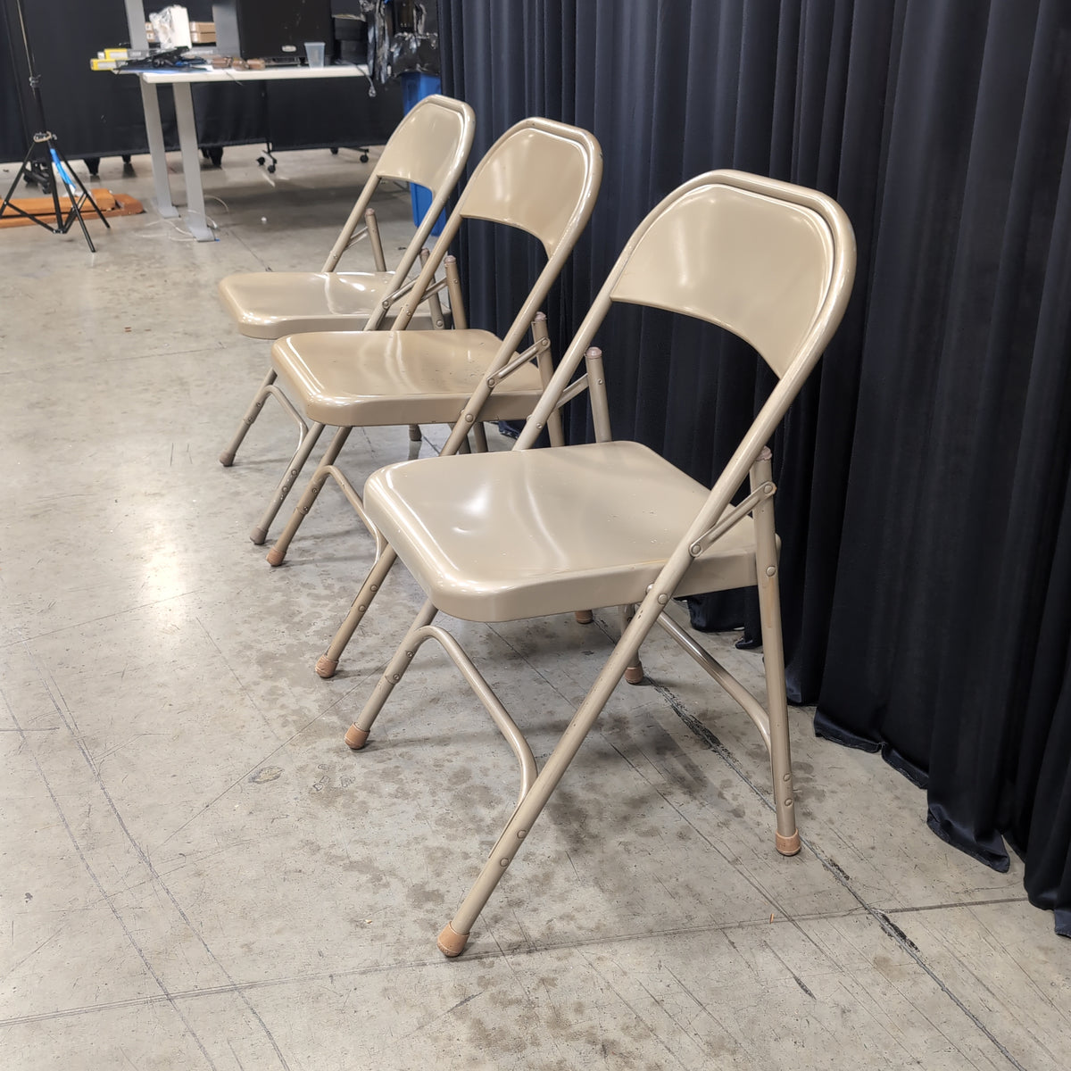 Set of Three Tan Metal Folding Chair with Rubber Feet