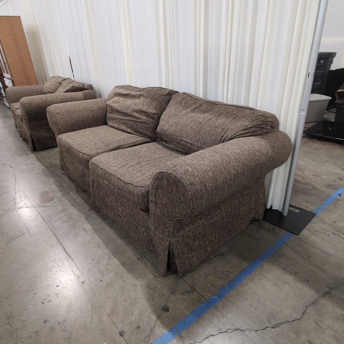 Textured Brown Rolled Arm Couch with Skirted Base