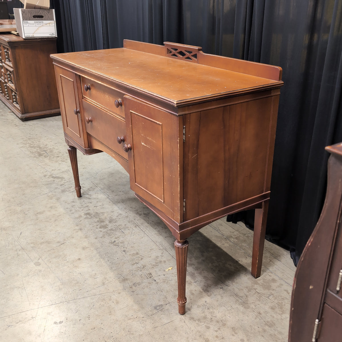 Warm Toned Wood Buffet with Fluted Legs