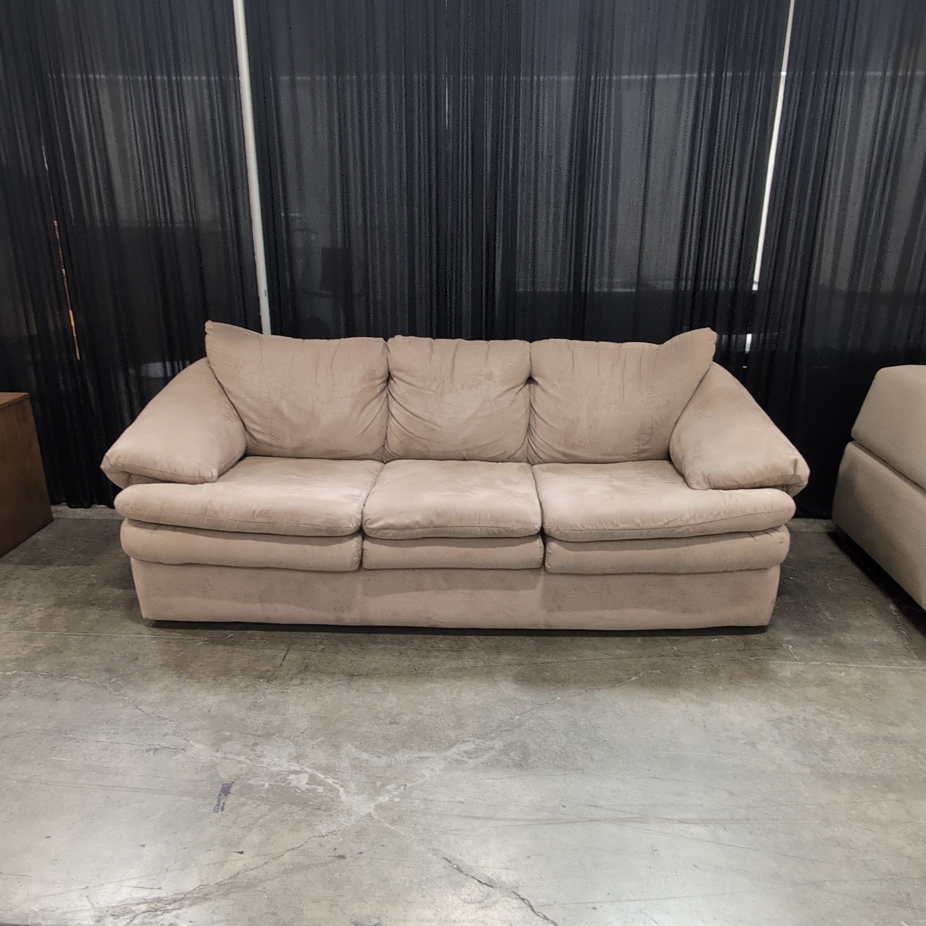 Light Brown Three-Cushion Couch in Microfiber