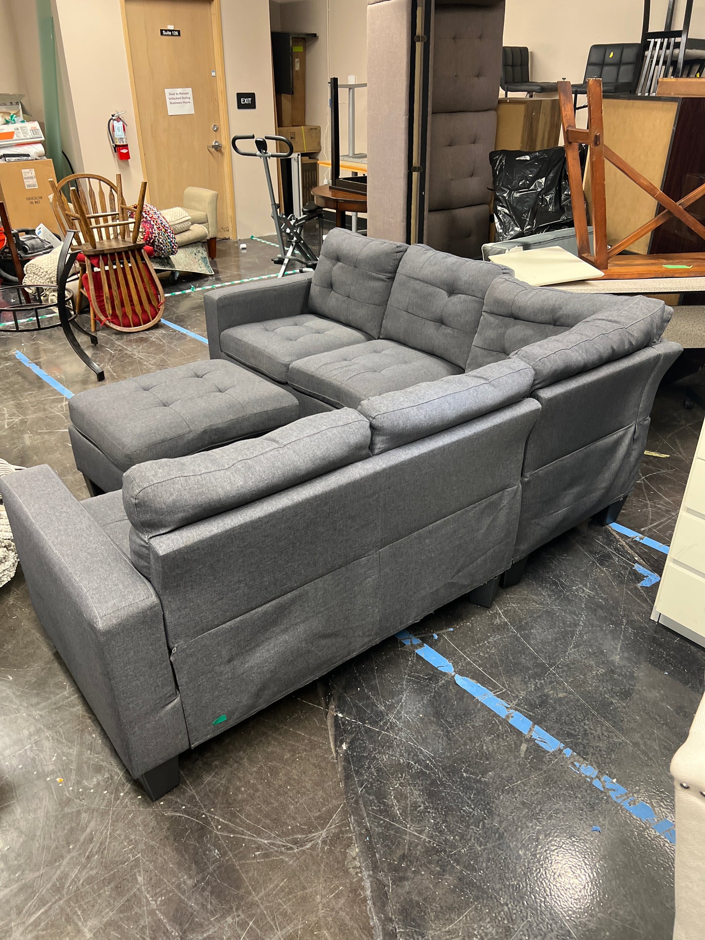 Dark Gray Upholstered Sectional with Ottoman