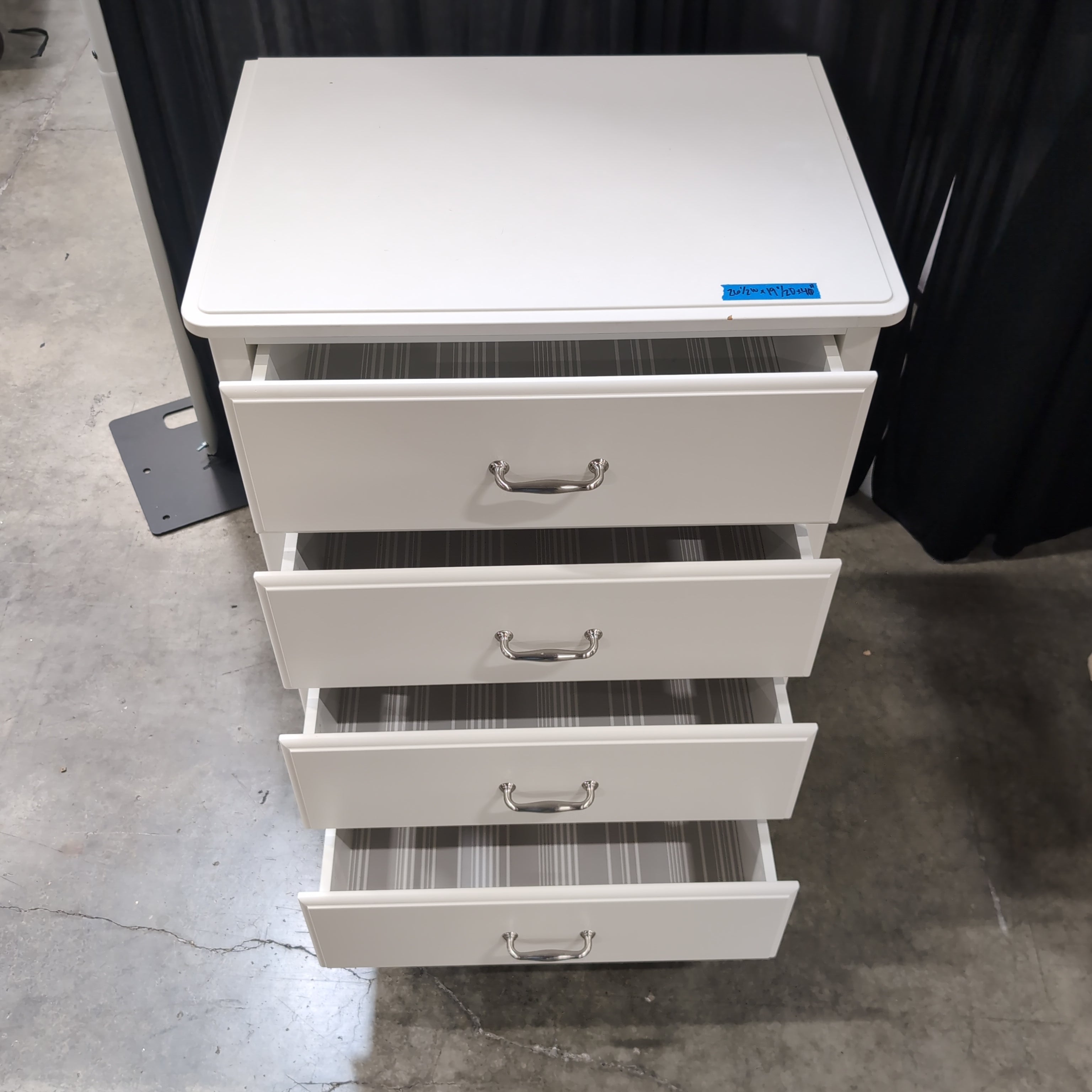 White Four-Drawer Dresser with Silver Pulls