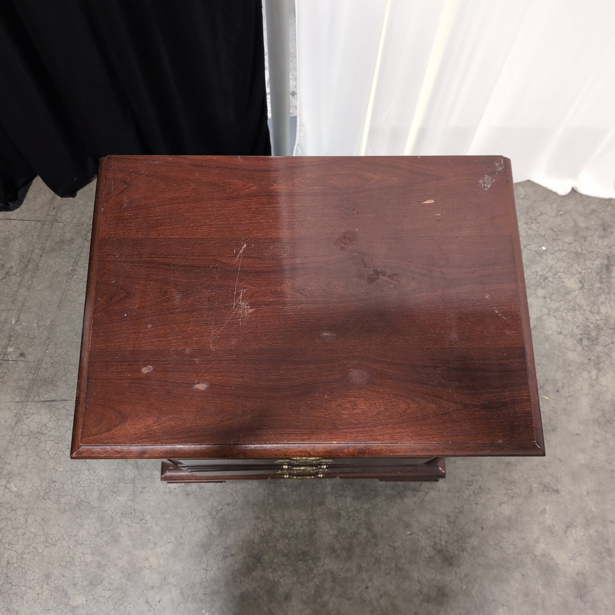 Dark Cherry Wood Nightstand with Ornate Hardware