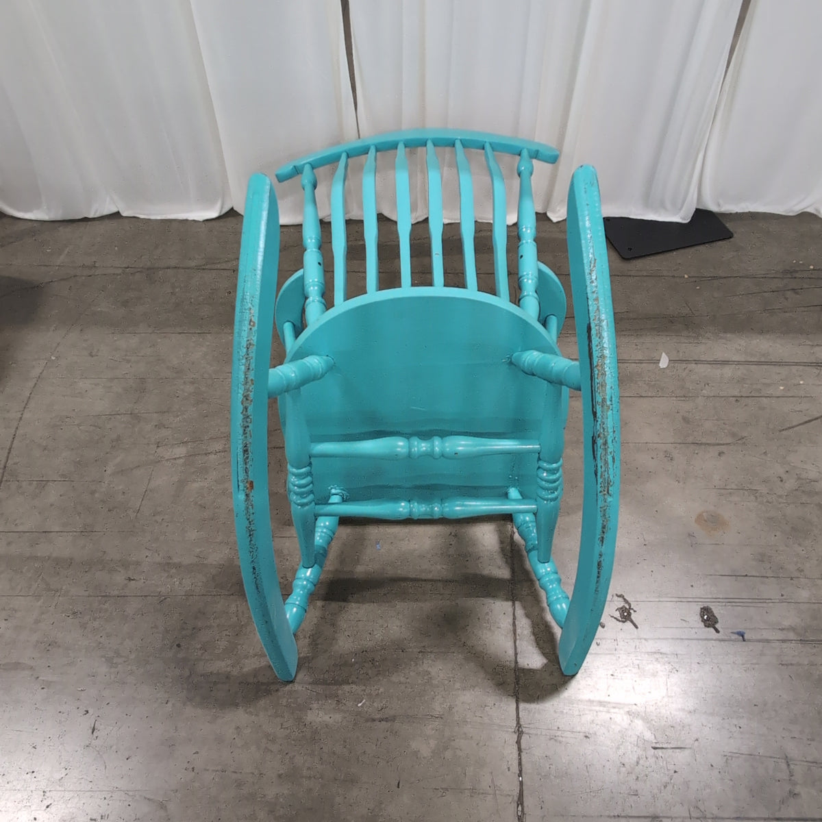 Bright Teal Spindle Back Rocking Chair in Wood