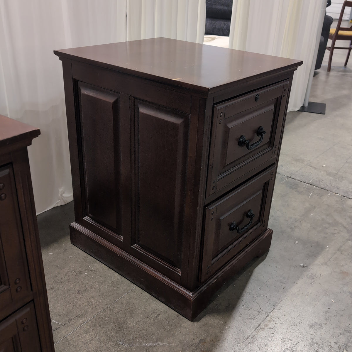 Dark Wood Two-Drawer Filing Cabinet with Ornate Pulls