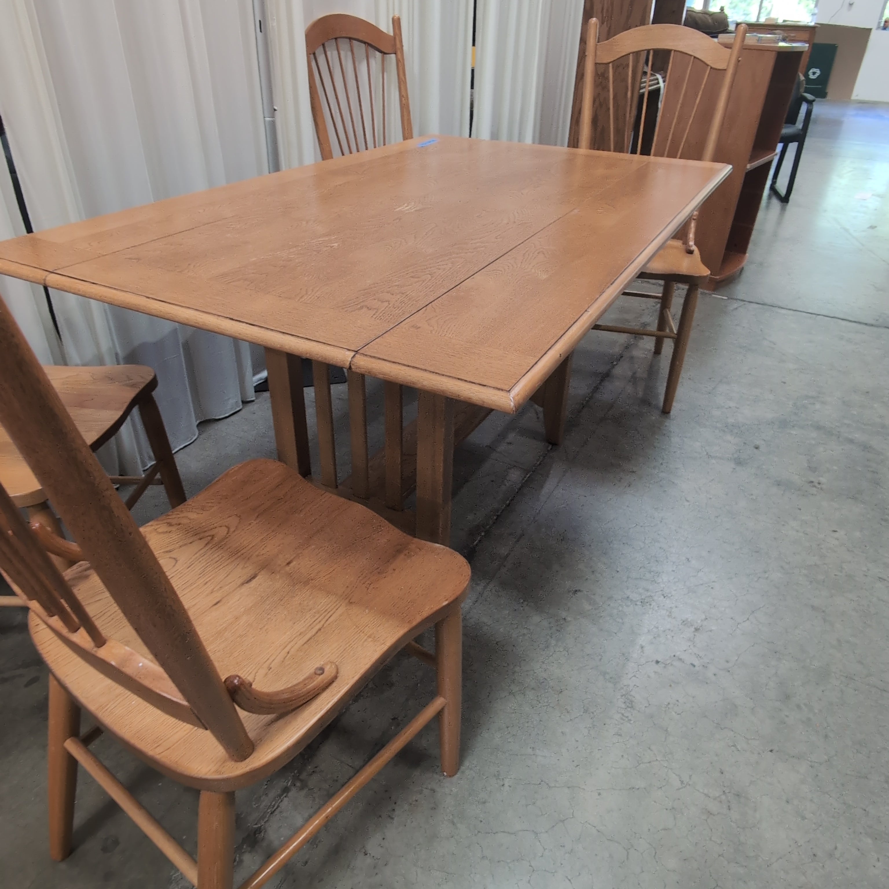 Oak Tone Drop Leaf Dining Table with Spindle Back Chairs