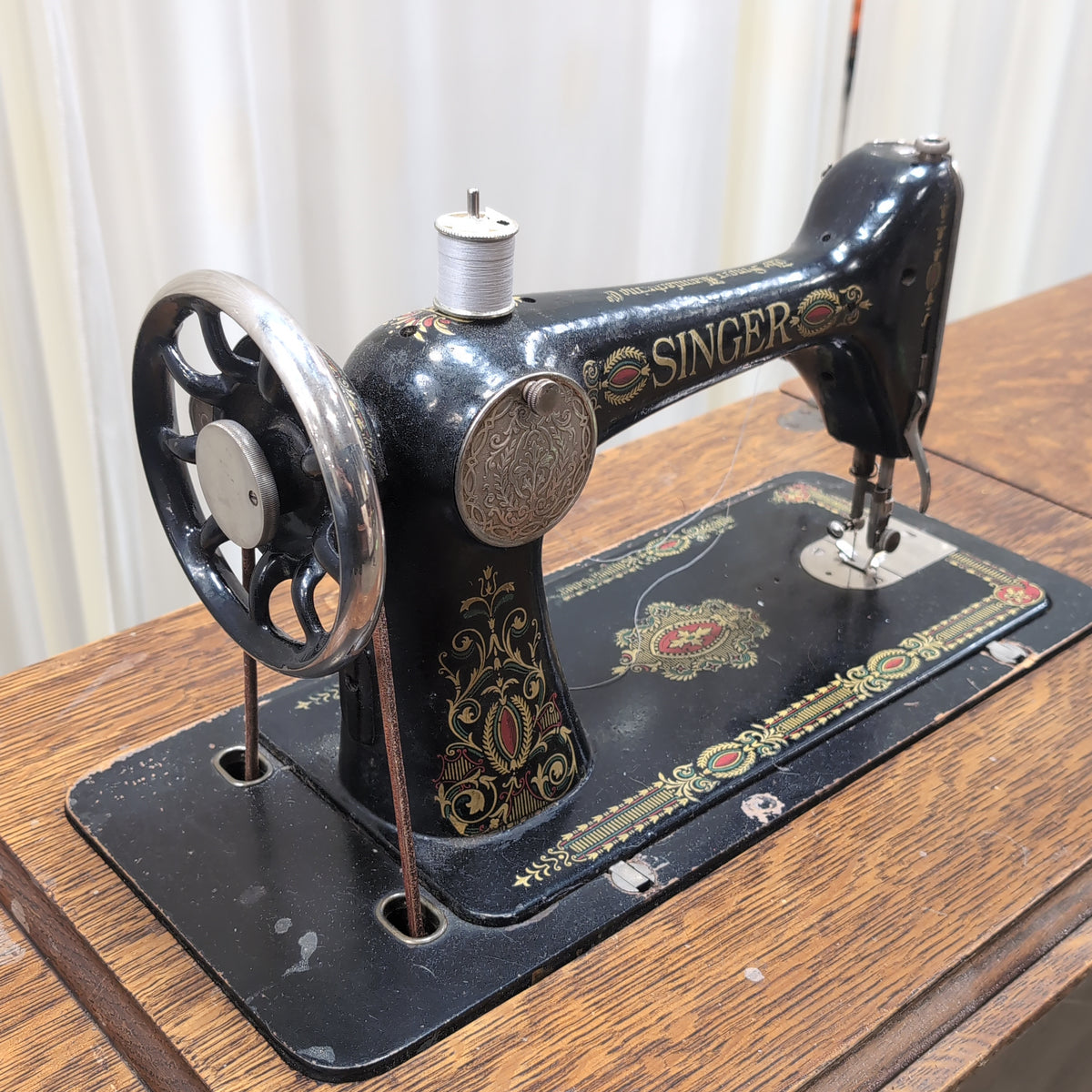 Vintage SINGER Sewing Machine with Dark Wood Cabinet