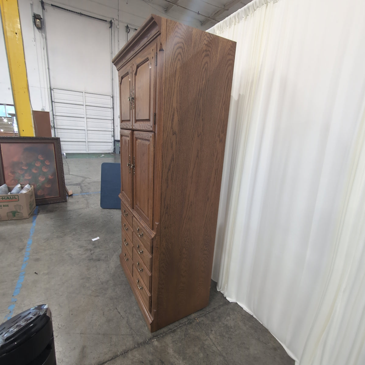Medium Brown Wood Armoire with Ornate Hardware
