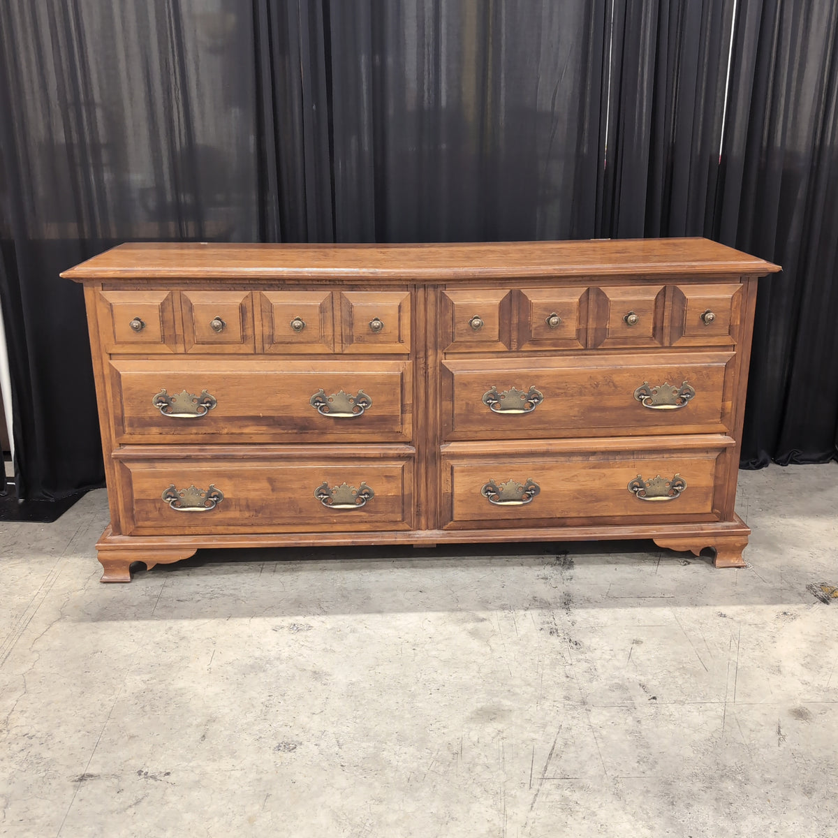 Traditional Brown Wood Dresser with Ornate Hardware