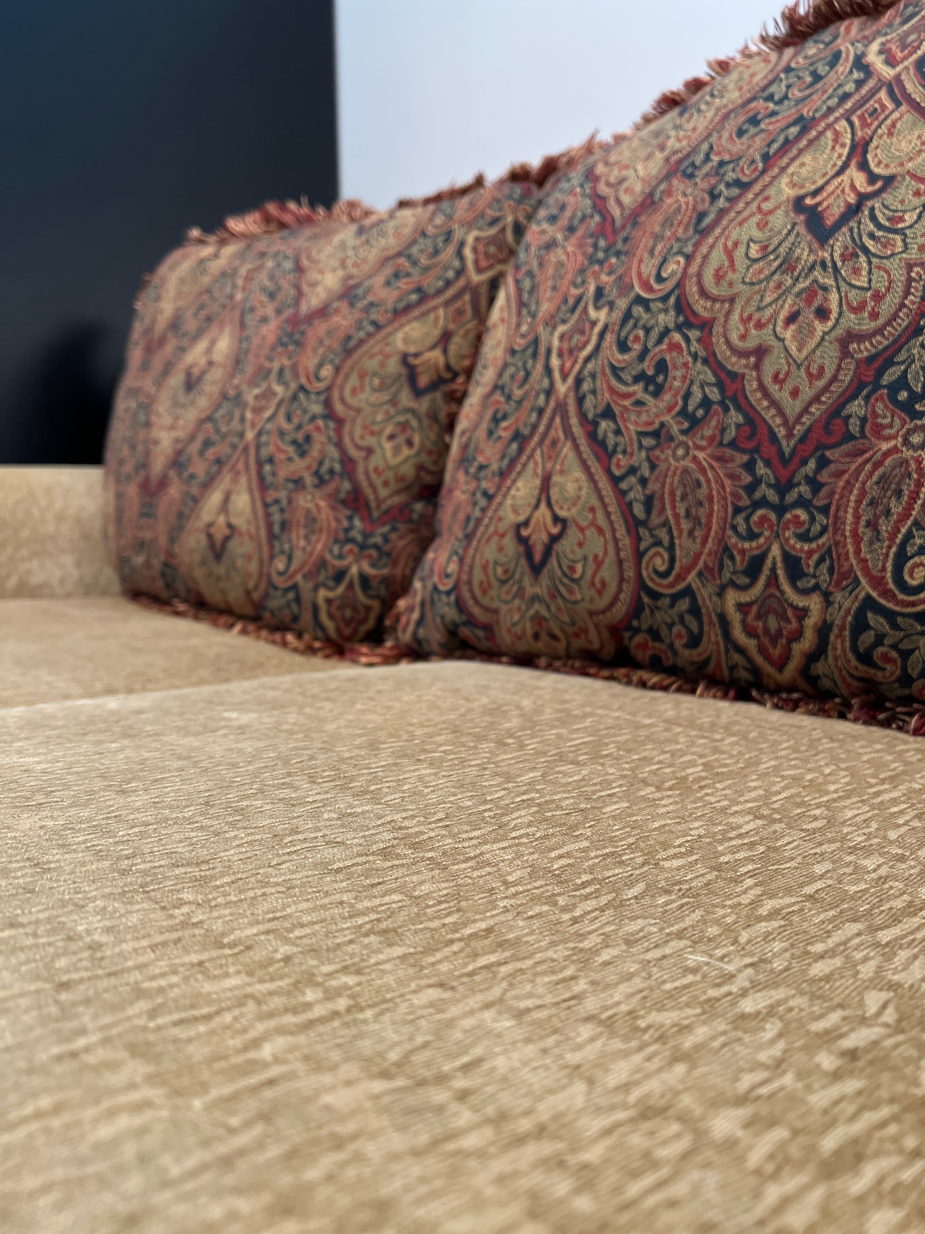 Beige Broyhill Sofa with Ornate Pillows