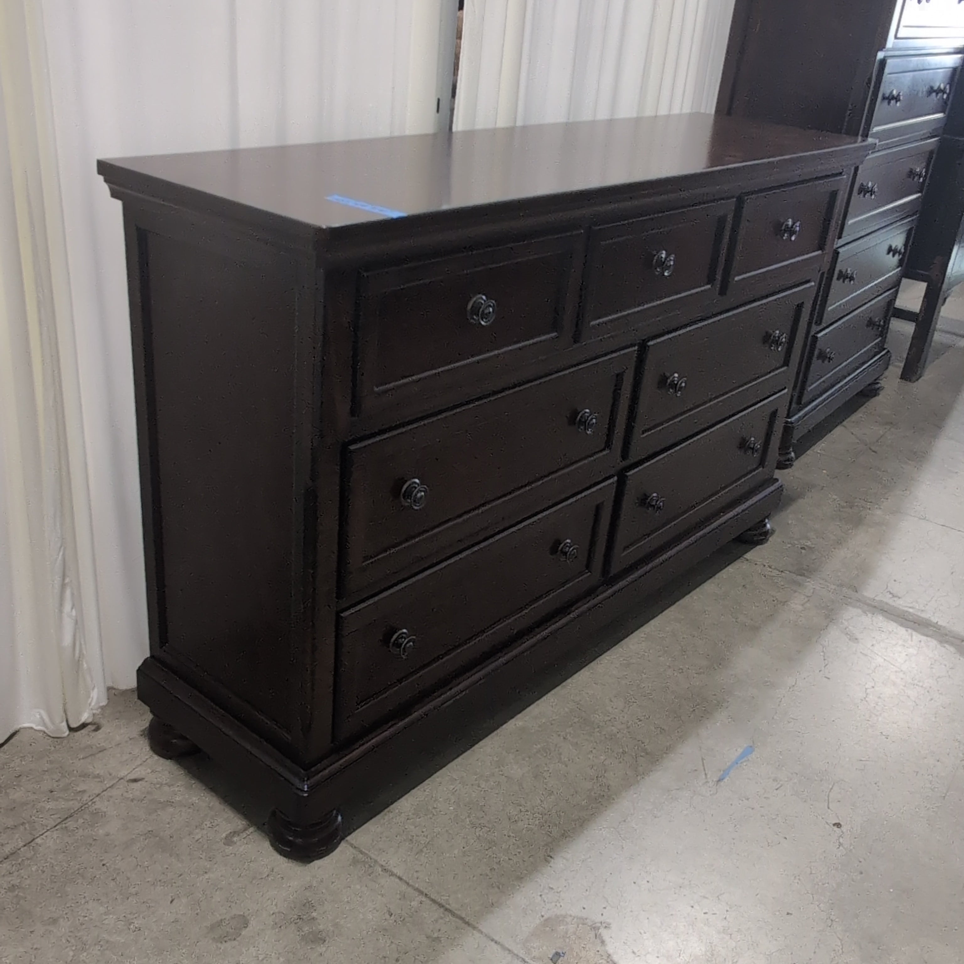 Classic Dark Wood Seven-Drawer Dresser with Round Hardware