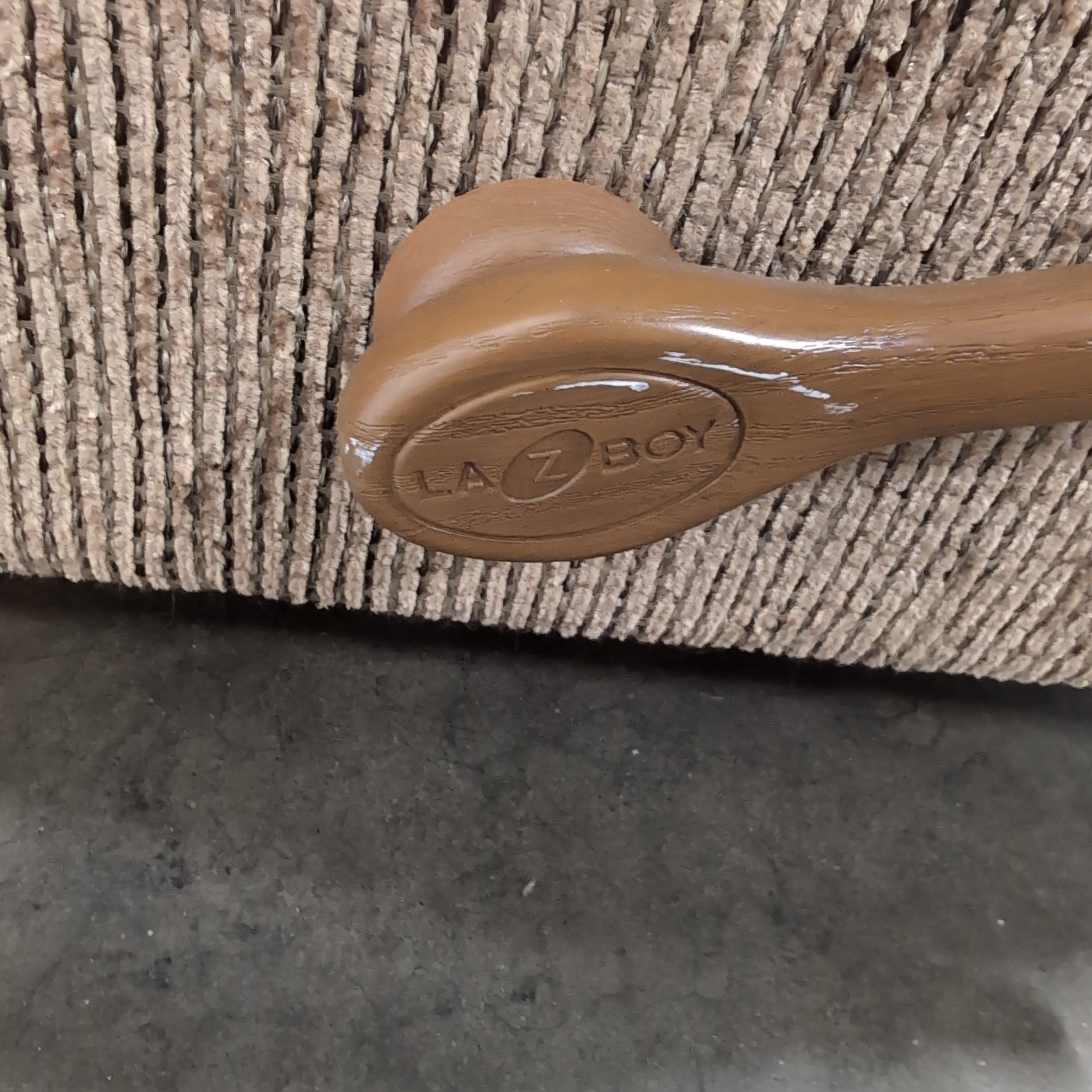 Tan Textured Fabric Recliner with Rolled Arms