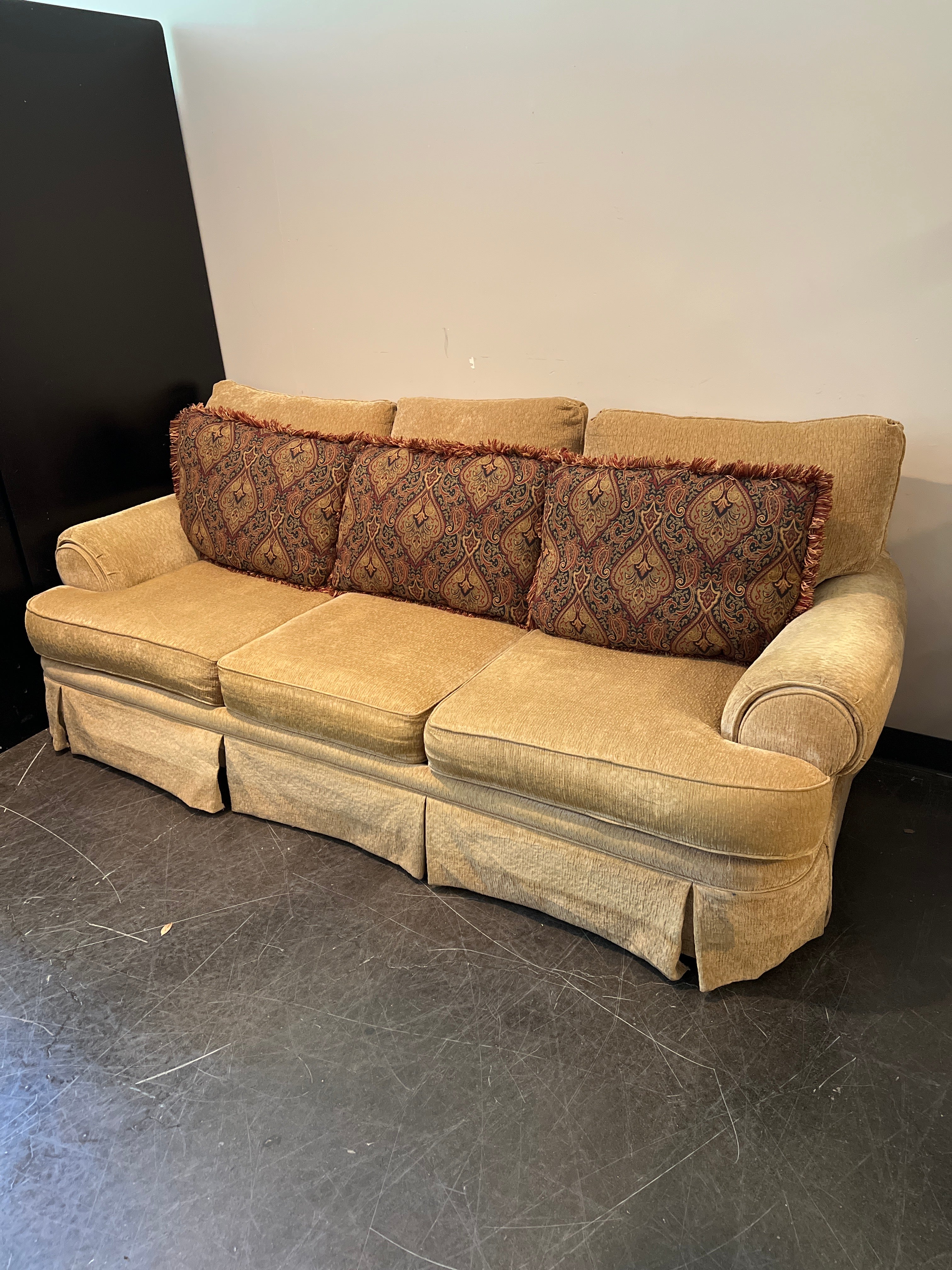 Beige Broyhill Sofa with Ornate Pillows