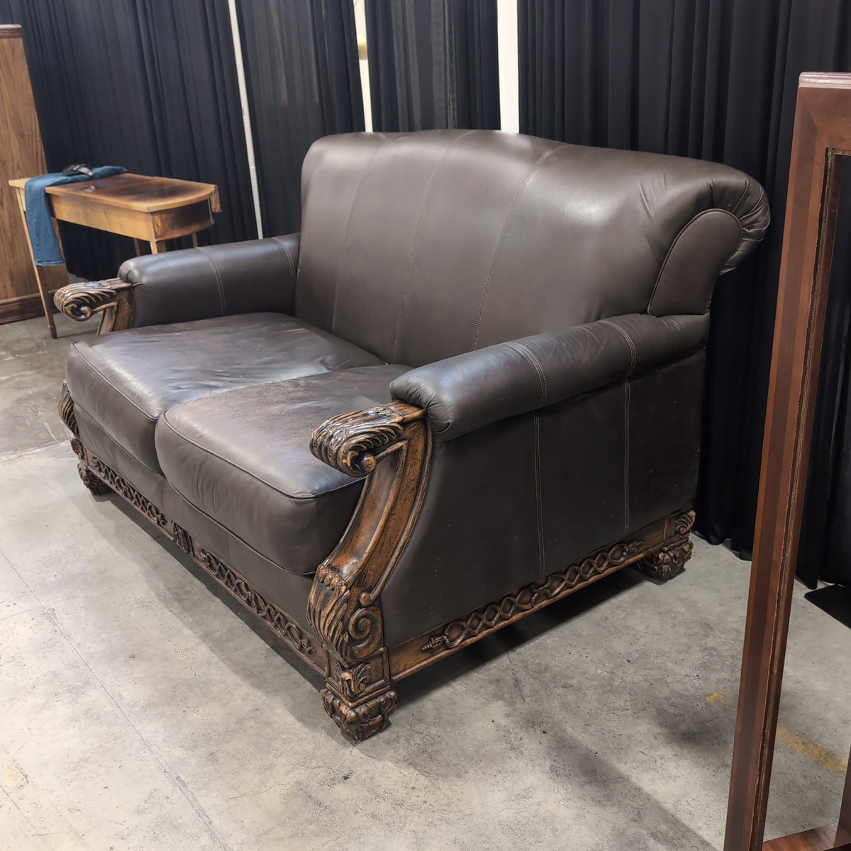 Dark Brown Leatherette Carved Wood Loveseat