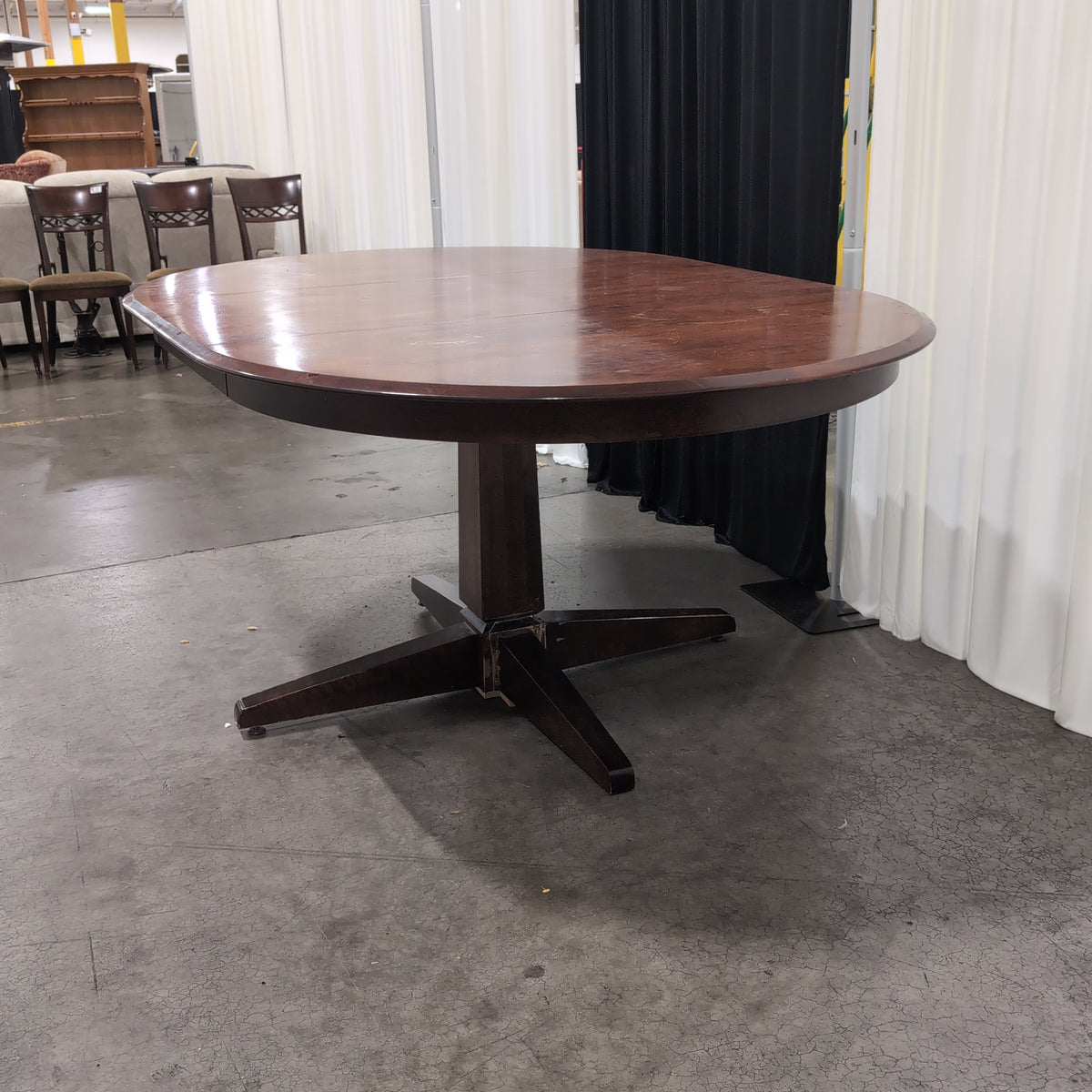 Cherry Tone Oval Wood Dining Table with Center Leaf
