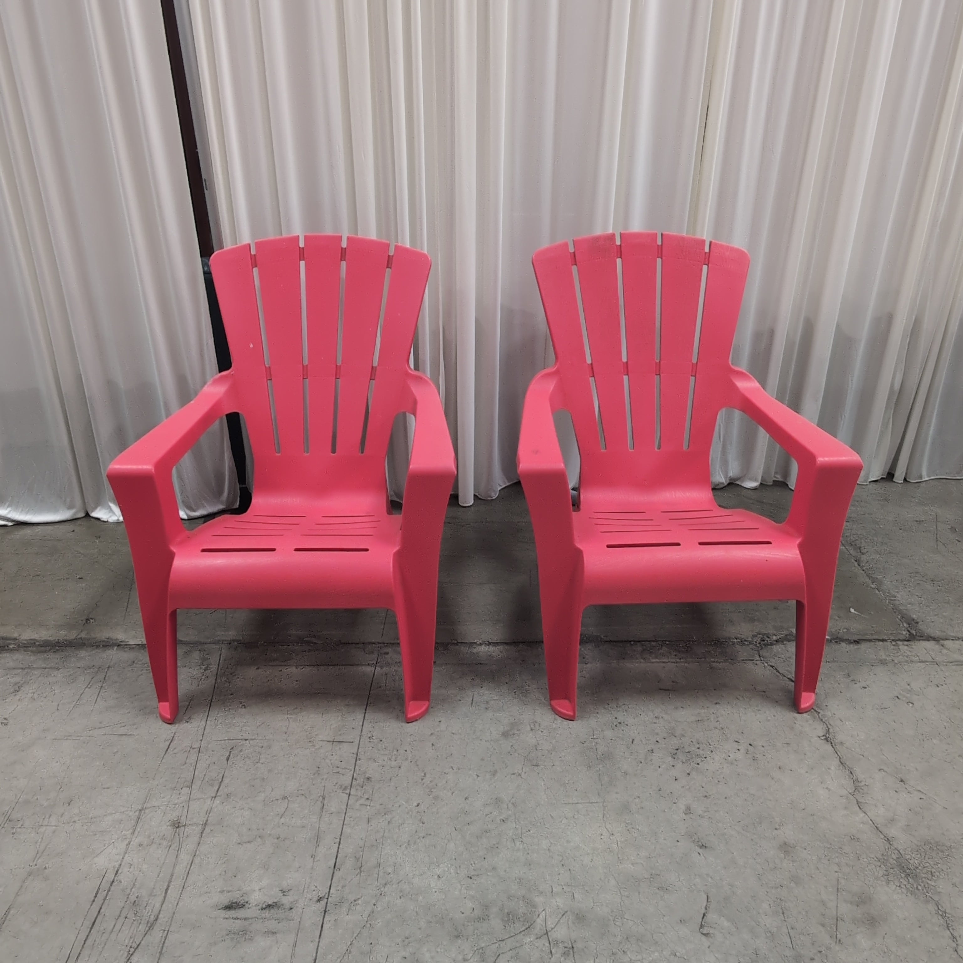 Pair of Red Plastic outdoor chairs
