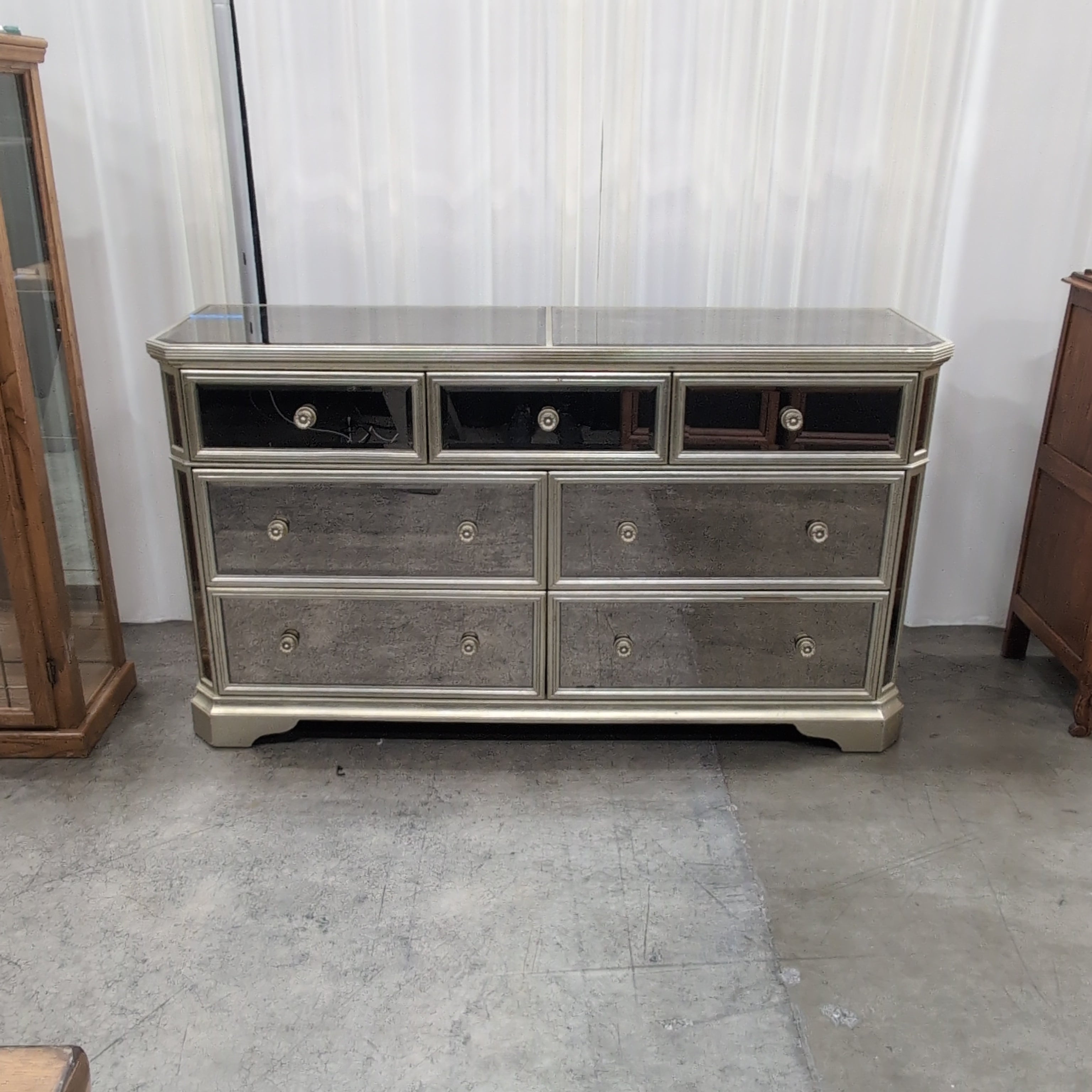 Champagne Mirrored Seven-Drawer Dresser with Ornate Pulls