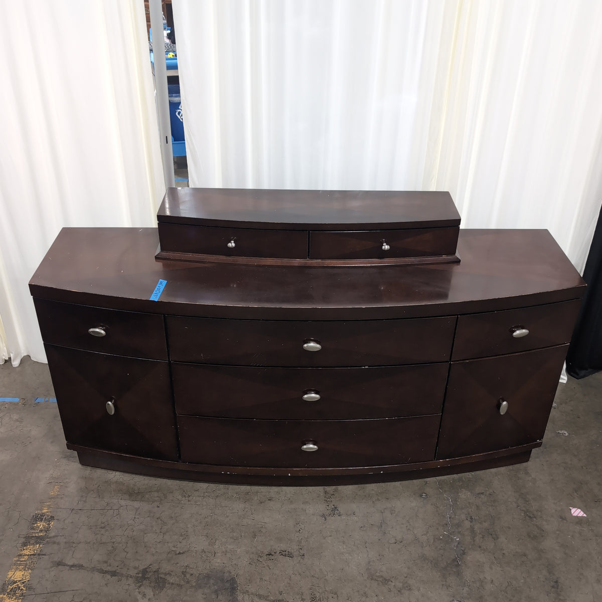 Dark Brown Curved Front Seven-Drawer Dresser