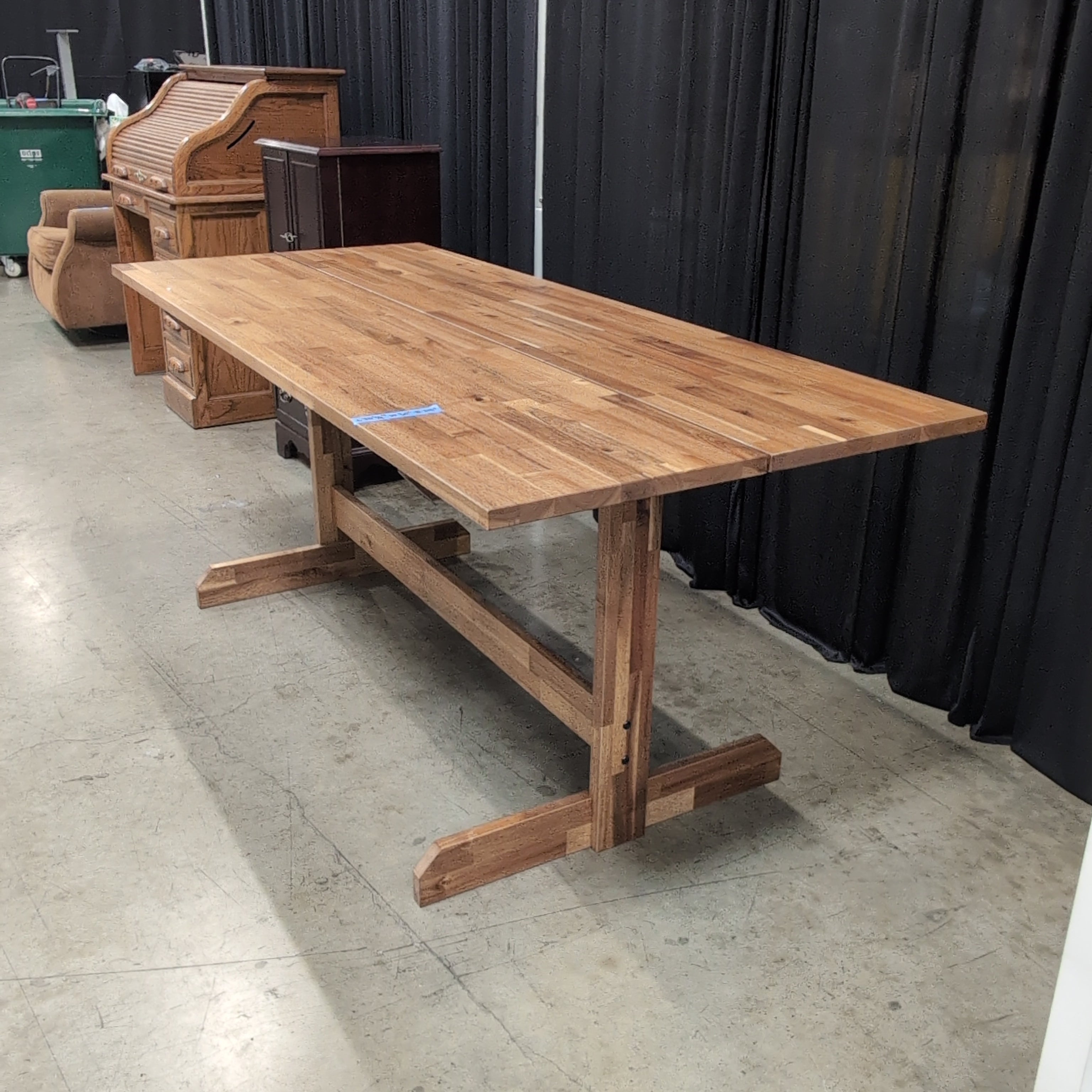 Warm Brown Wood Dining Table with Trestle Base