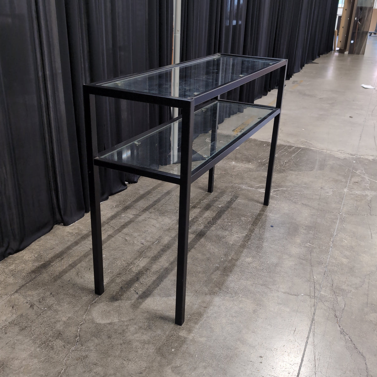 Black Metal Two-Tier Console Table with Glass Shelves