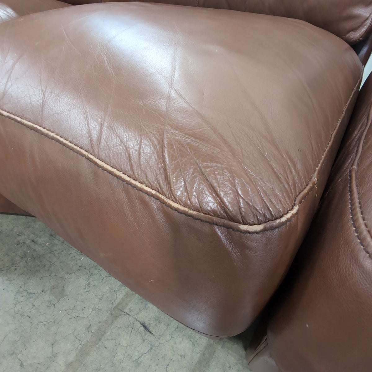 Brown Leather Curved Sectional Couch