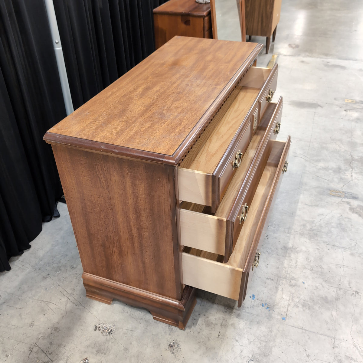 Traditional Brown Wood Dresser with Ornate Hardware