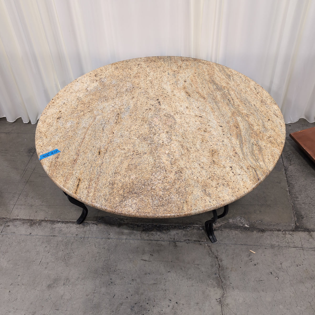 Oval Pink Speckled Granite Coffee Table with Wood Base