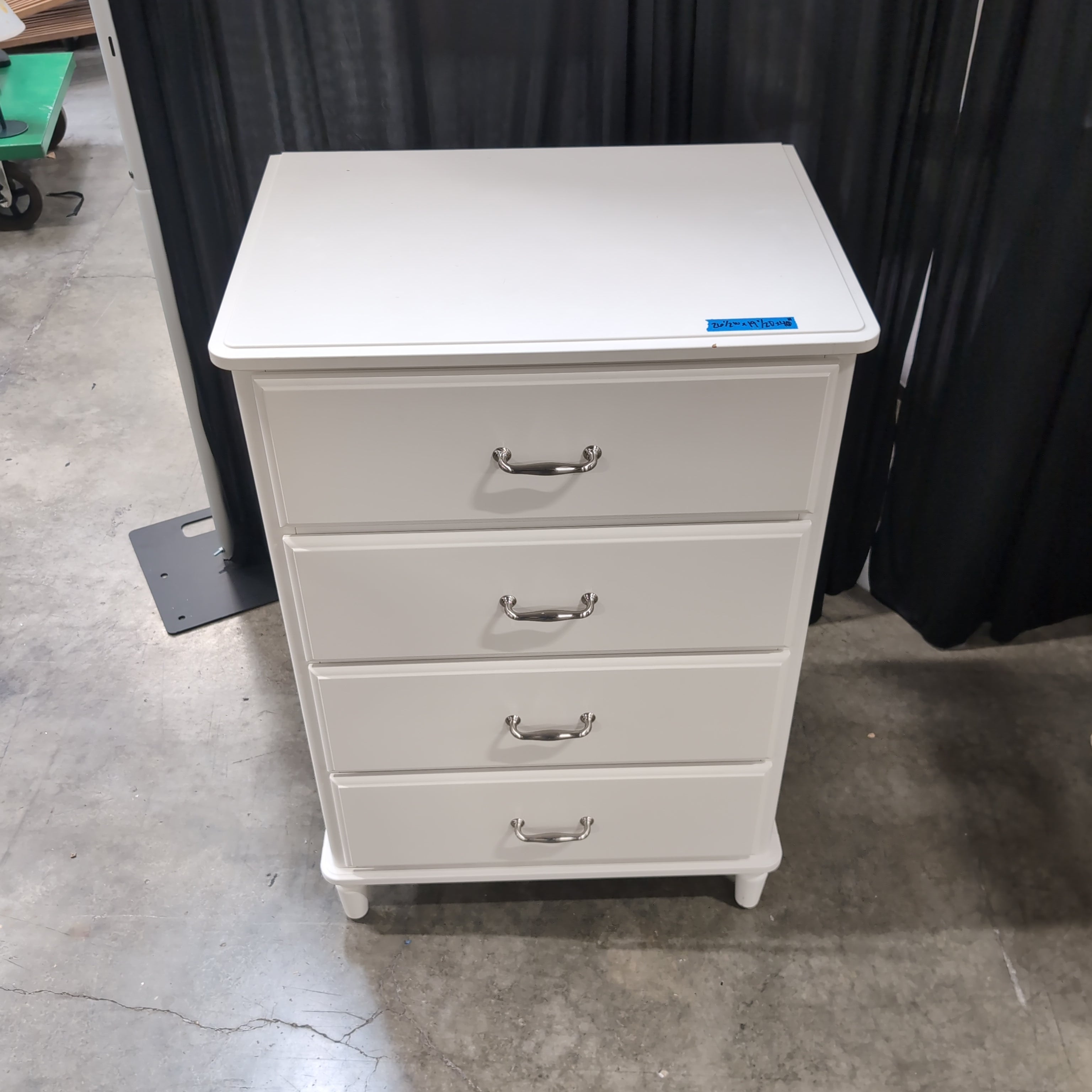 White Four-Drawer Dresser with Silver Pulls