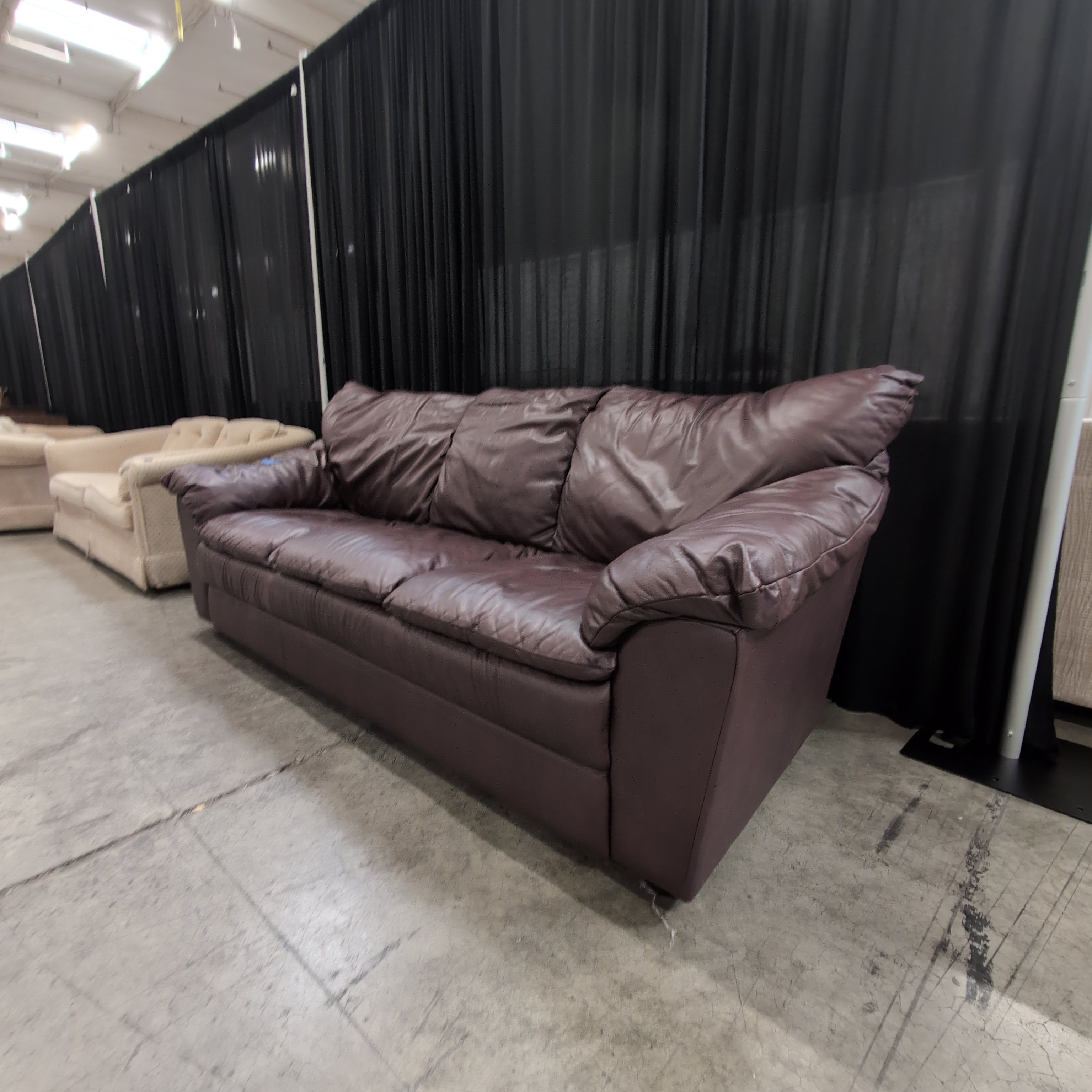 Dark Reddish Brown Three-Cushion Couch