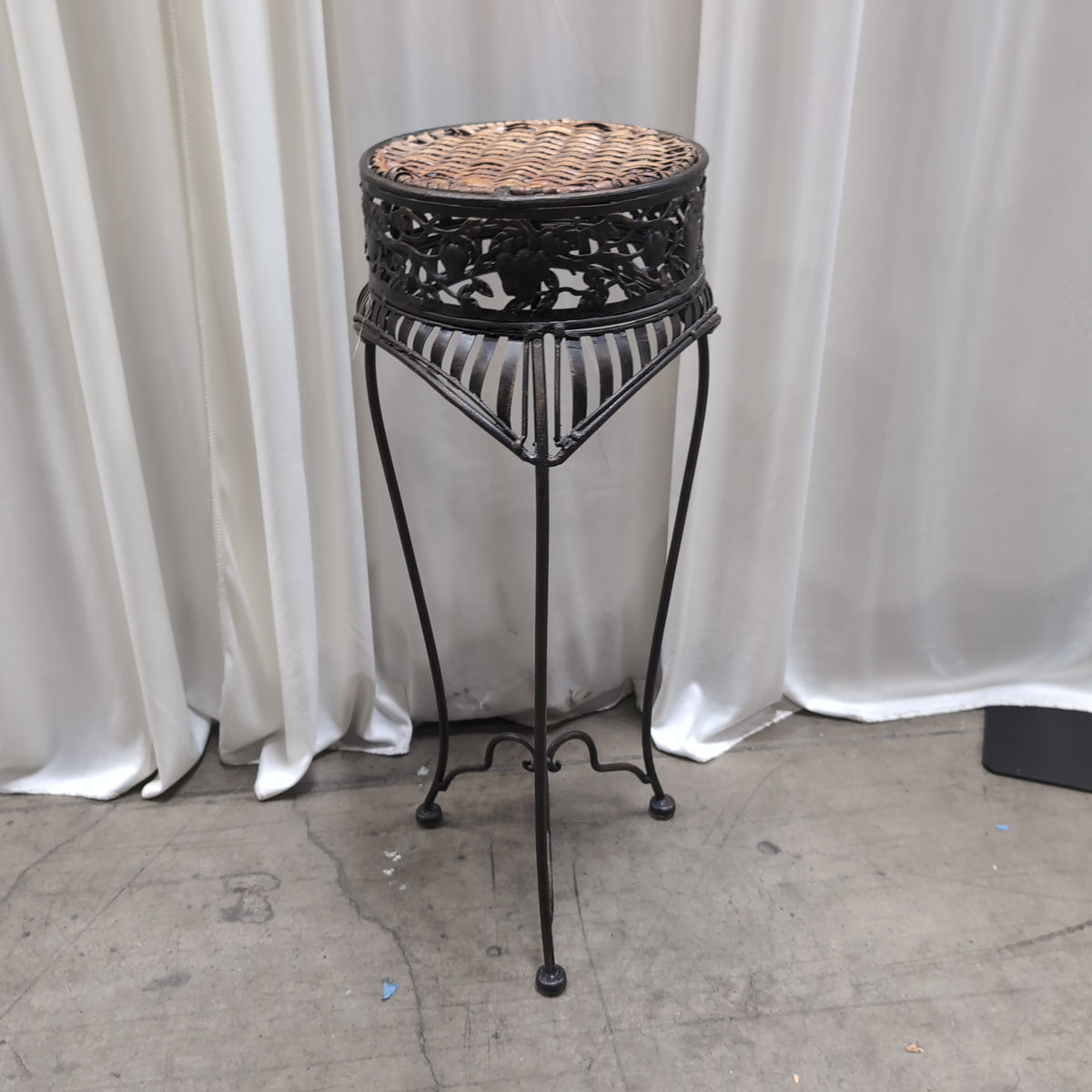 Ornate Dark Metal Plant Stand with Woven Top