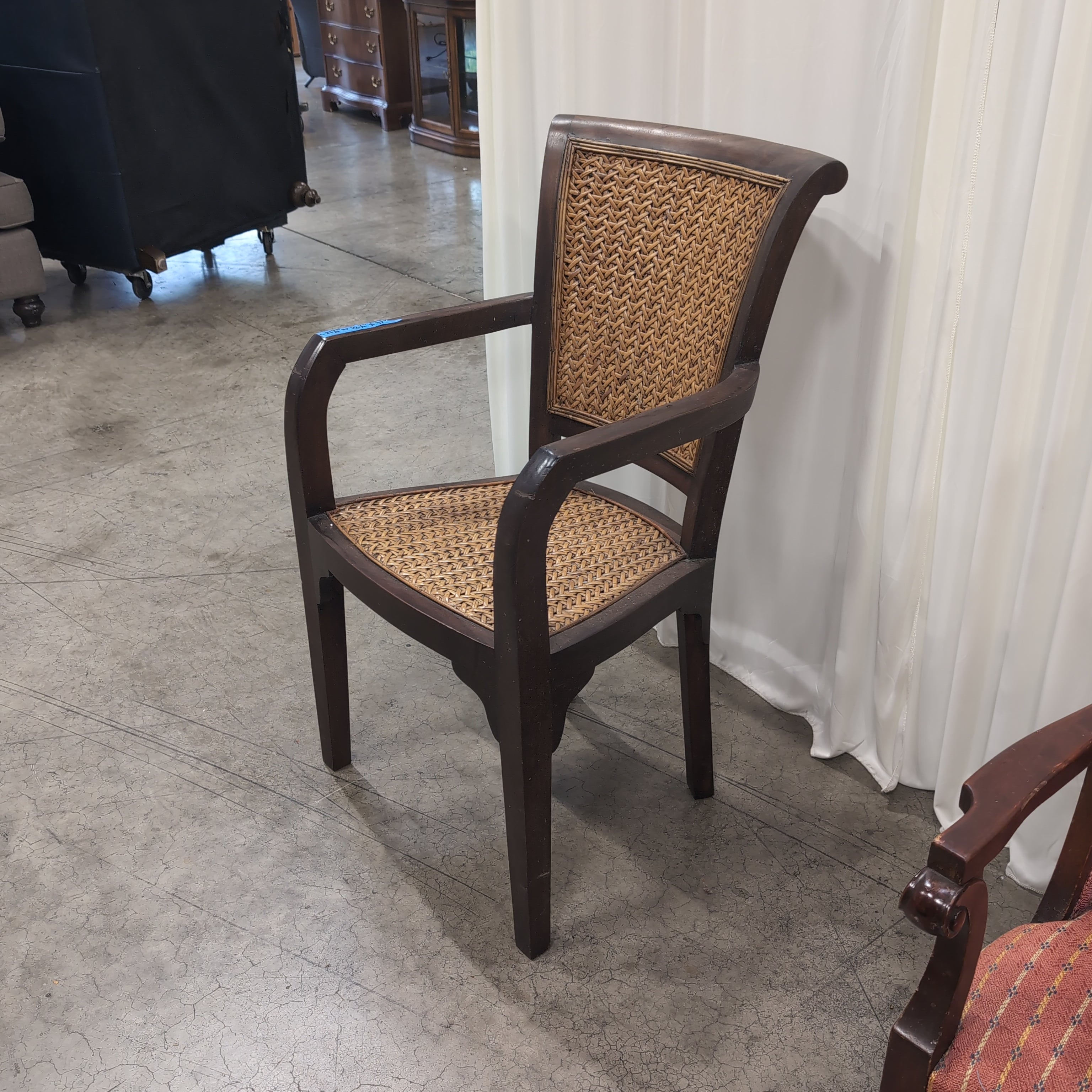 Dark Wood Armchair with Woven Cane Details