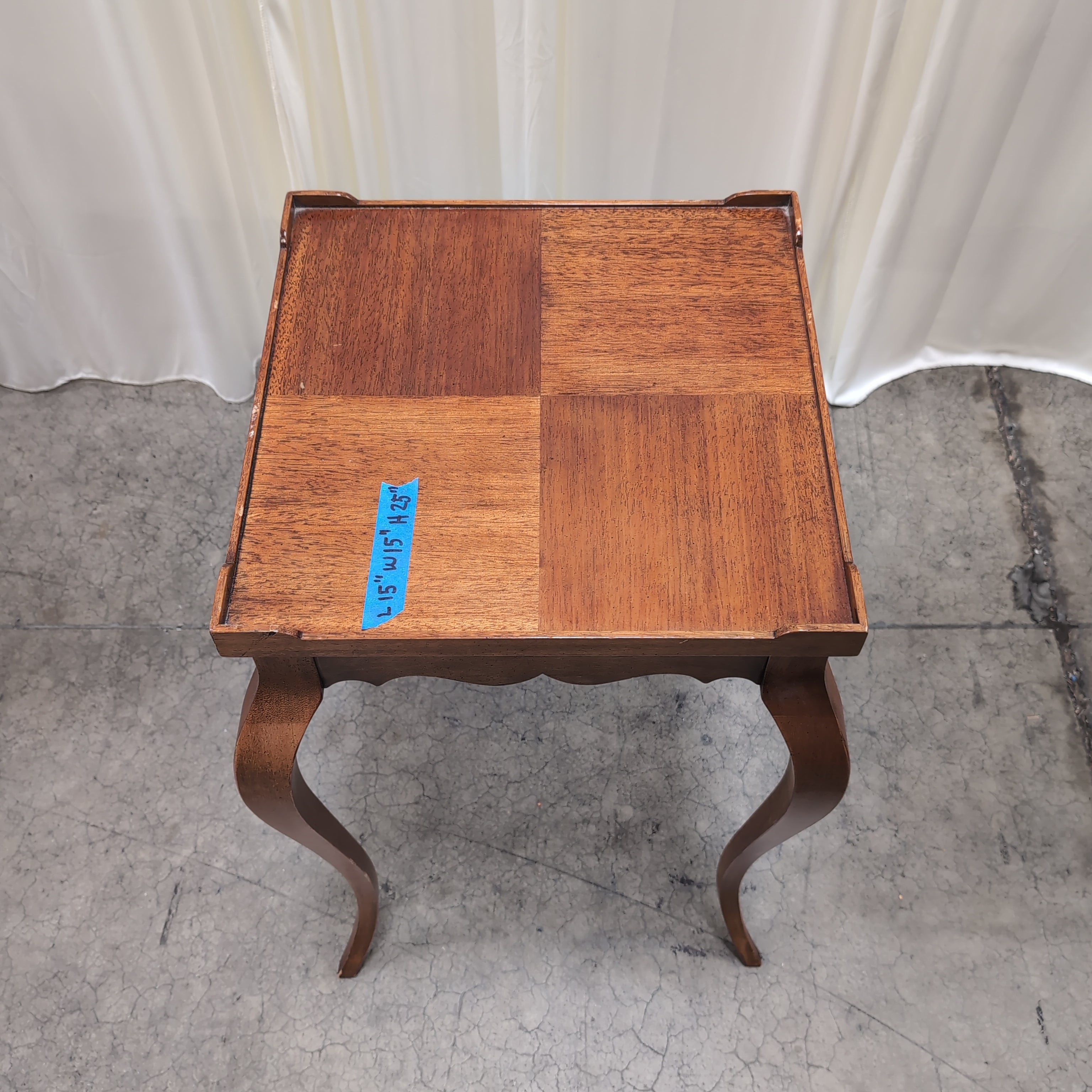 Dark Wood Scalloped End Table with Curved Legs
