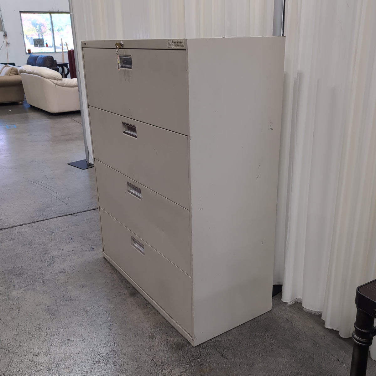 Grey Metal Four-Drawer Filing Cabinet with Lock