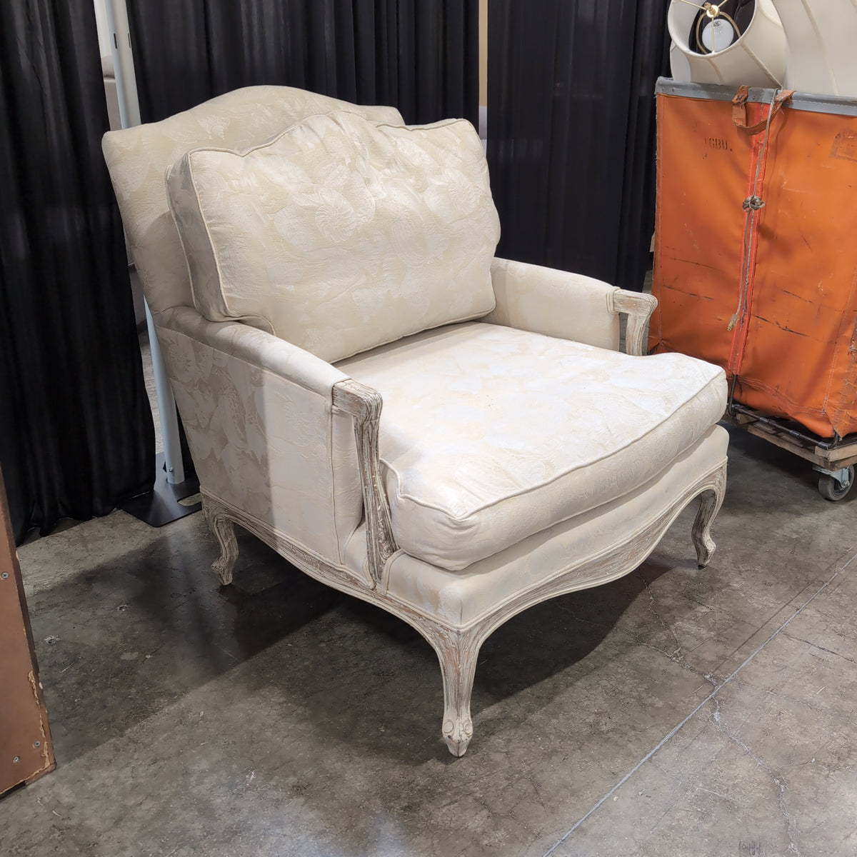 French Provincial Cream Upholstered Armchair with Carved Wood Frame