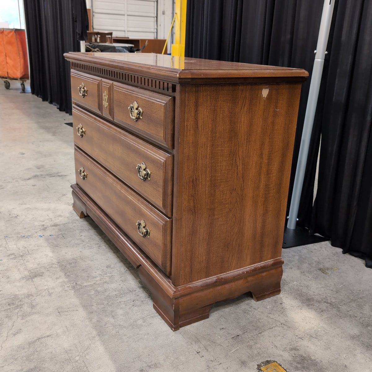 Traditional Brown Wood Dresser with Ornate Hardware