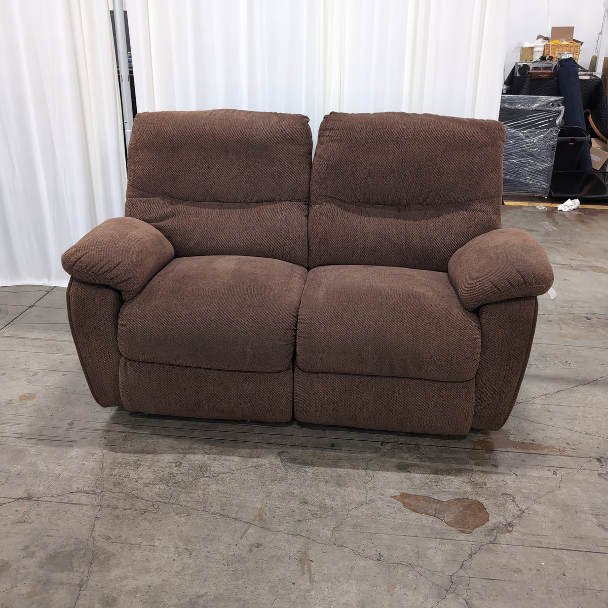Brown Textured Fabric Reclining Loveseat with Padded Arms