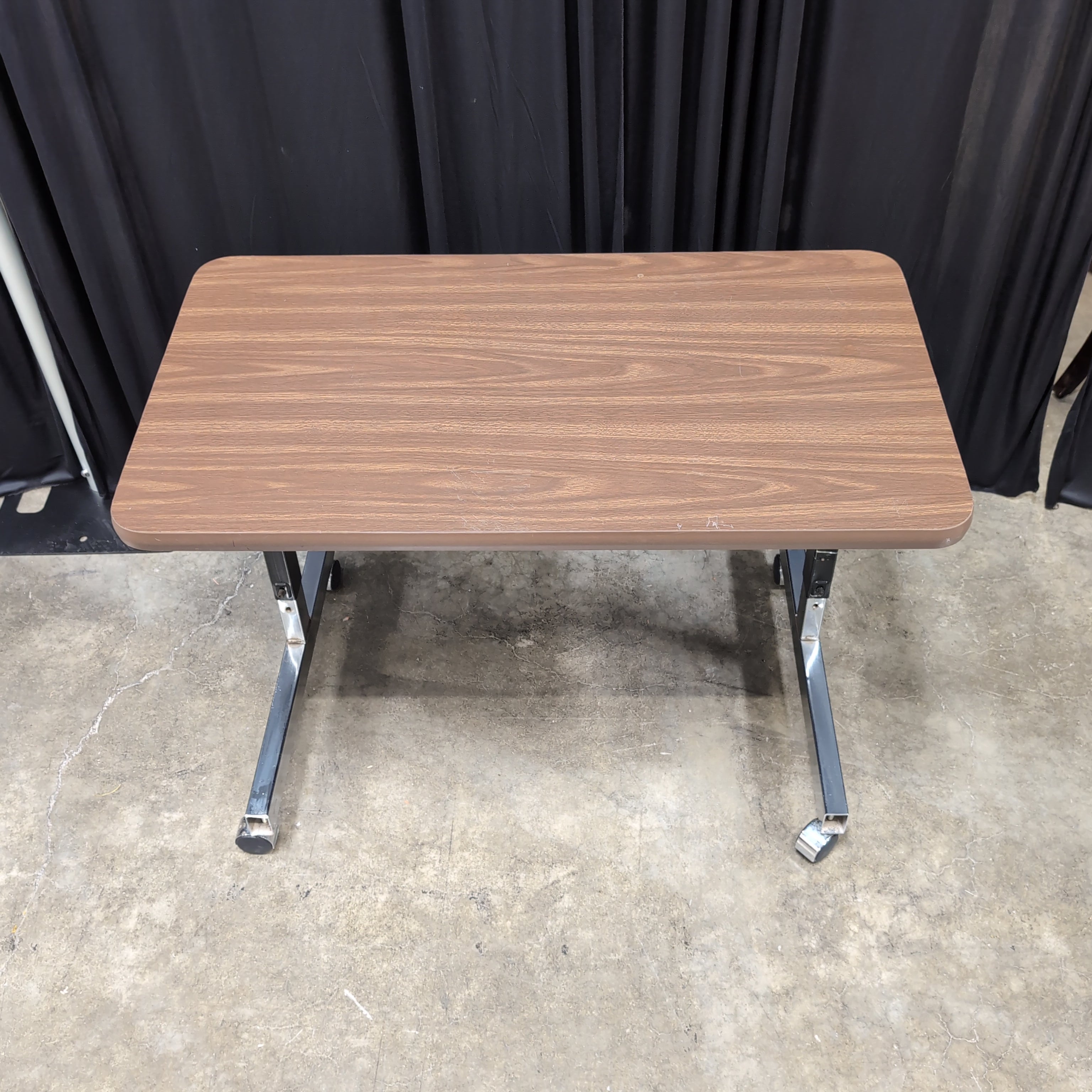 Brown Laminate Rectangular Utility Table with Casters